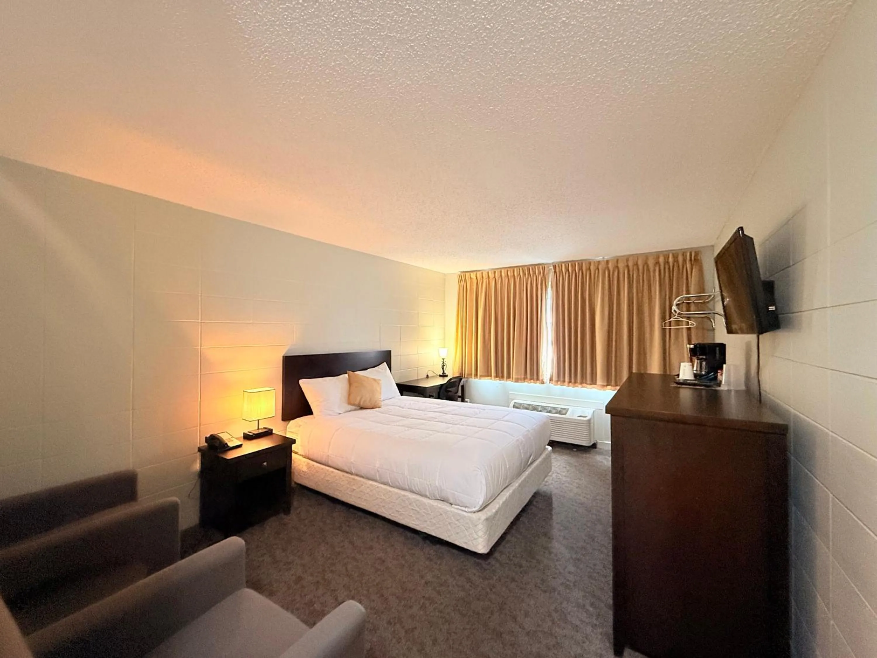 Bed in Capri Motor Inn