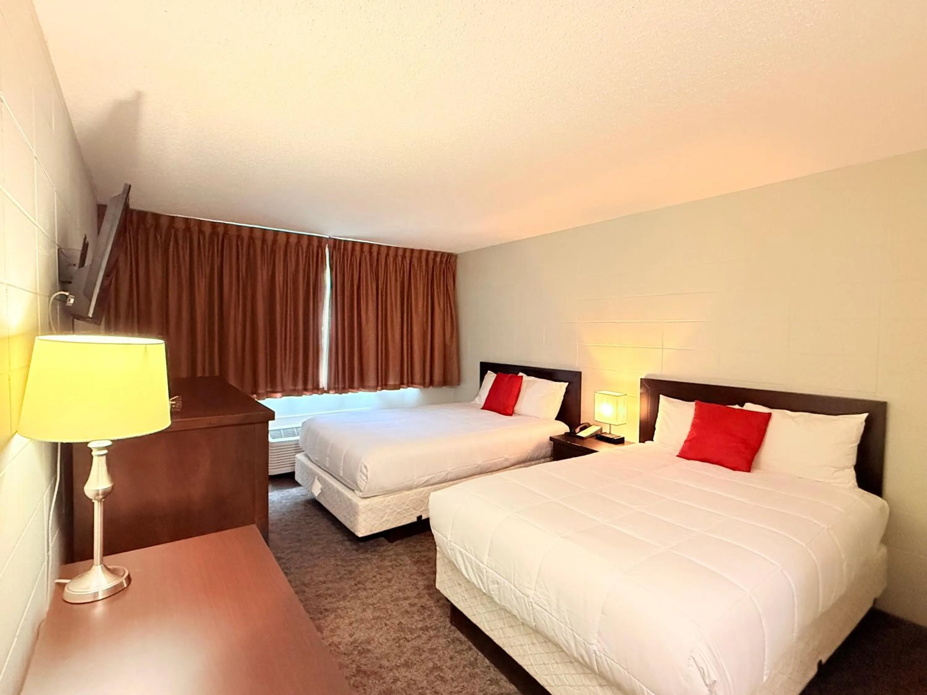 Bed in Capri Motor Inn