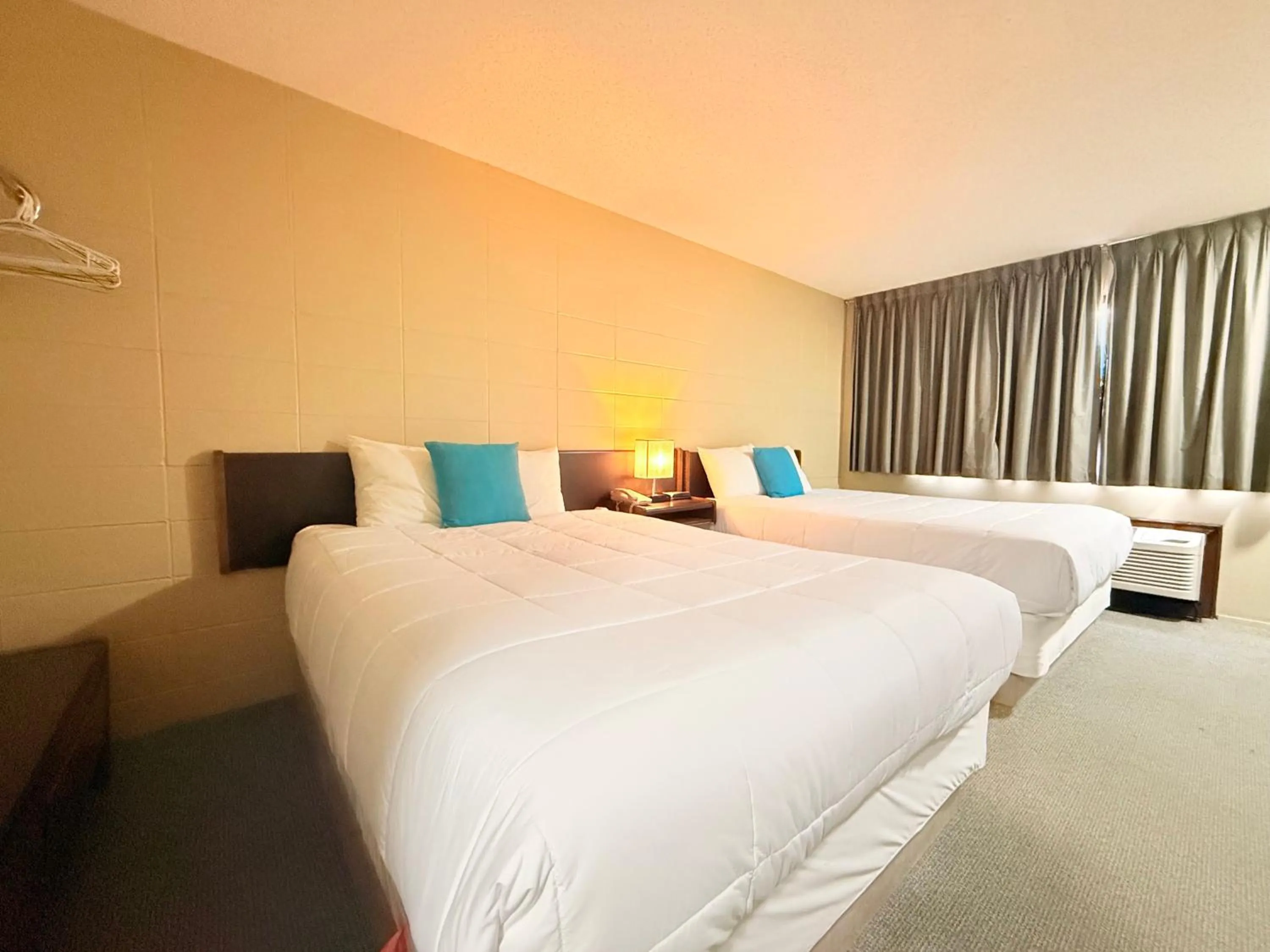 Bed in Capri Motor Inn