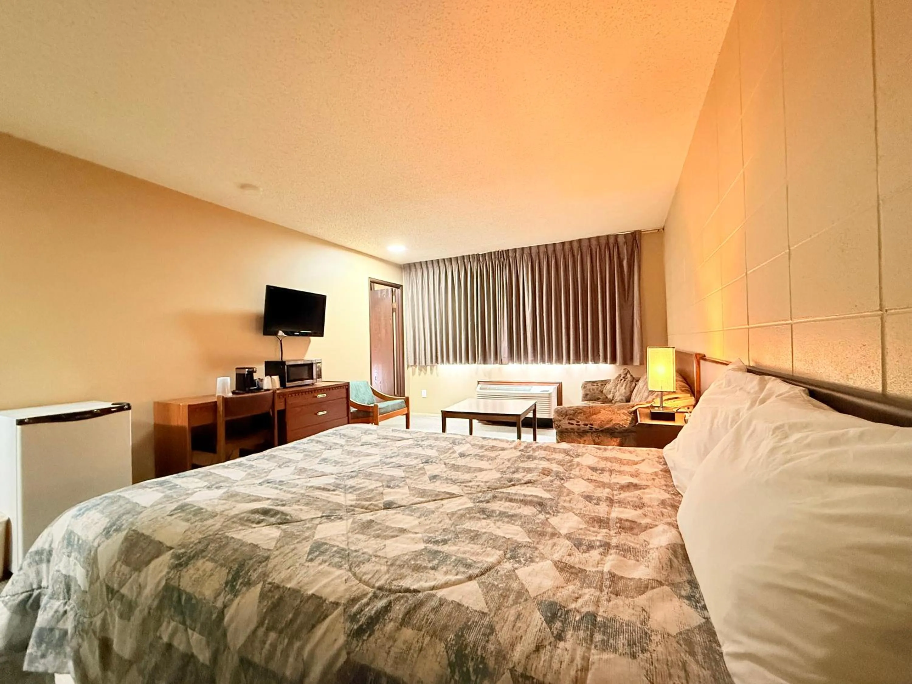 Bed in Capri Motor Inn