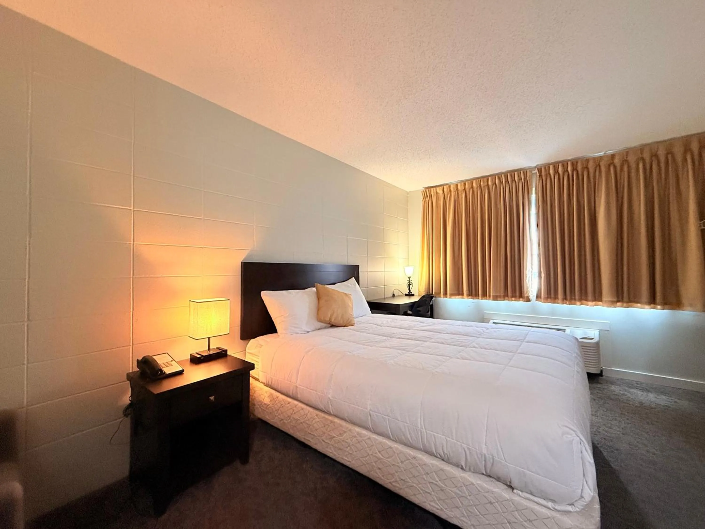 Bed in Capri Motor Inn