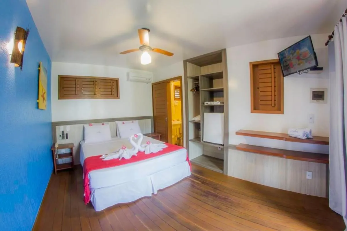 Bed in Pousada Windjeri