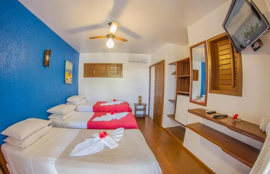 Bed in Pousada Windjeri