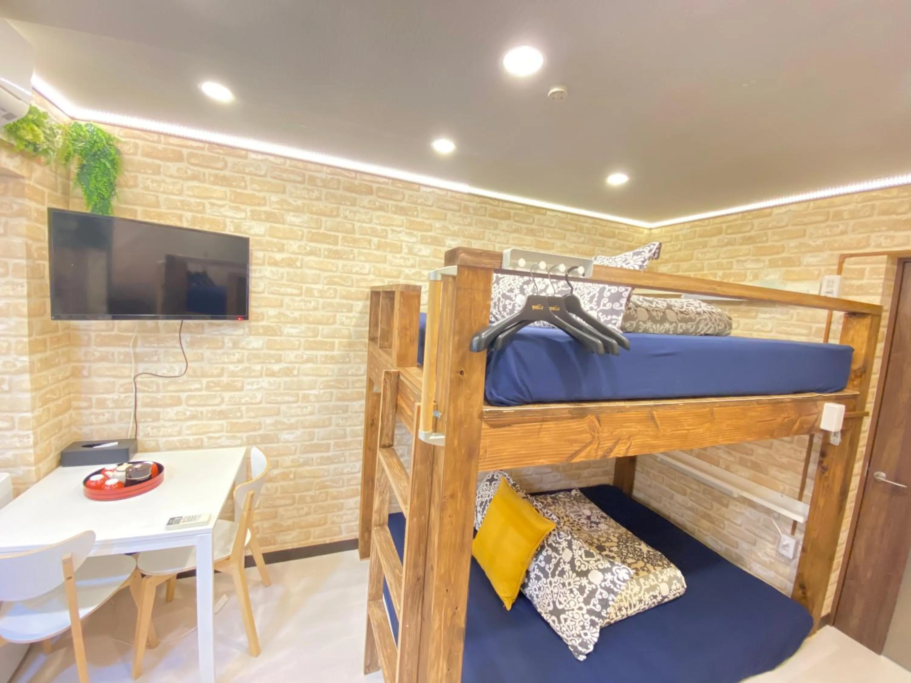 Bed in Hotel Orange House