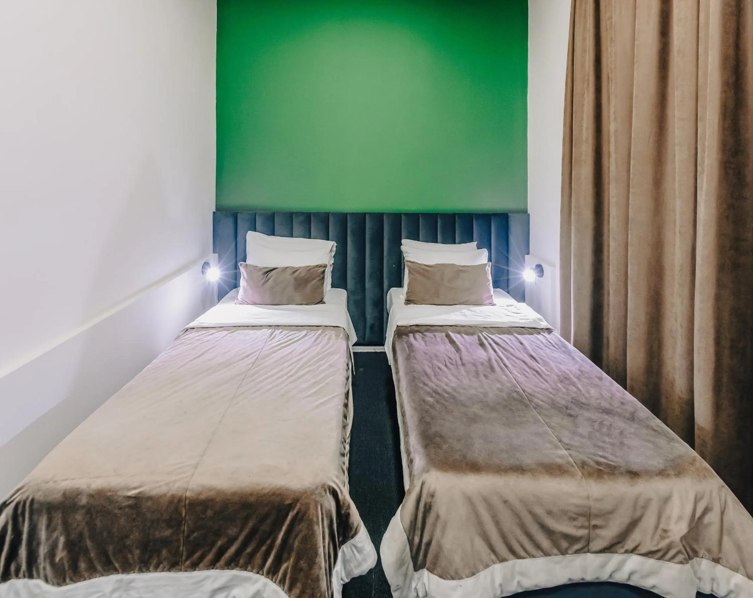 Bed in Seven Boutique Hotel Baku