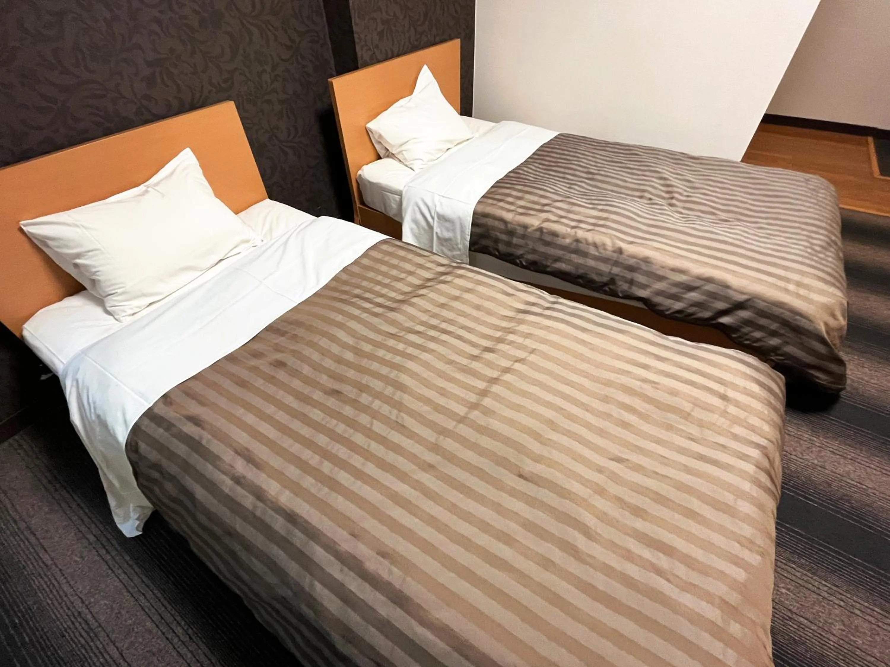 Bed in Itoen Hotel Shima