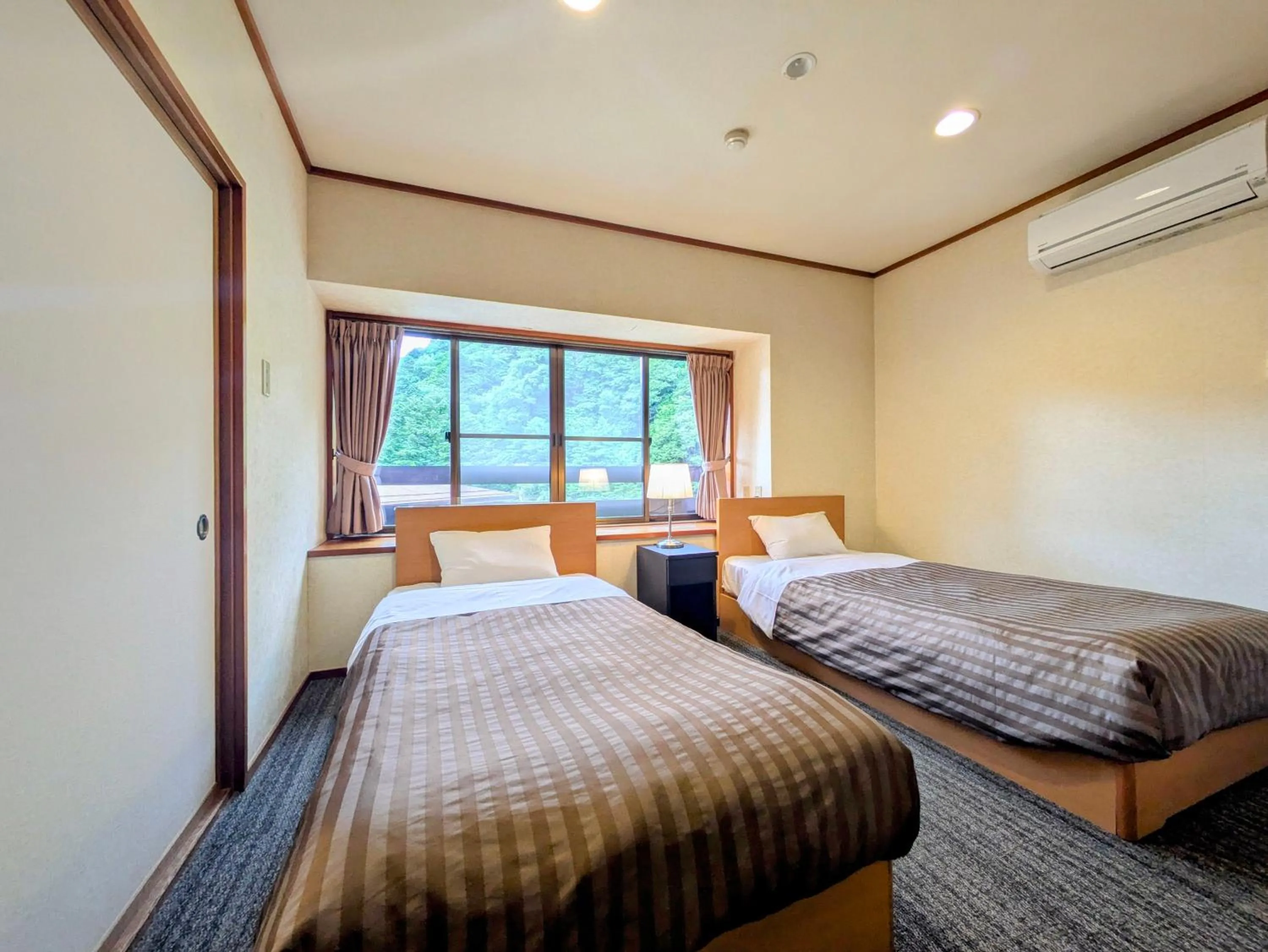 Bed in Itoen Hotel Shima