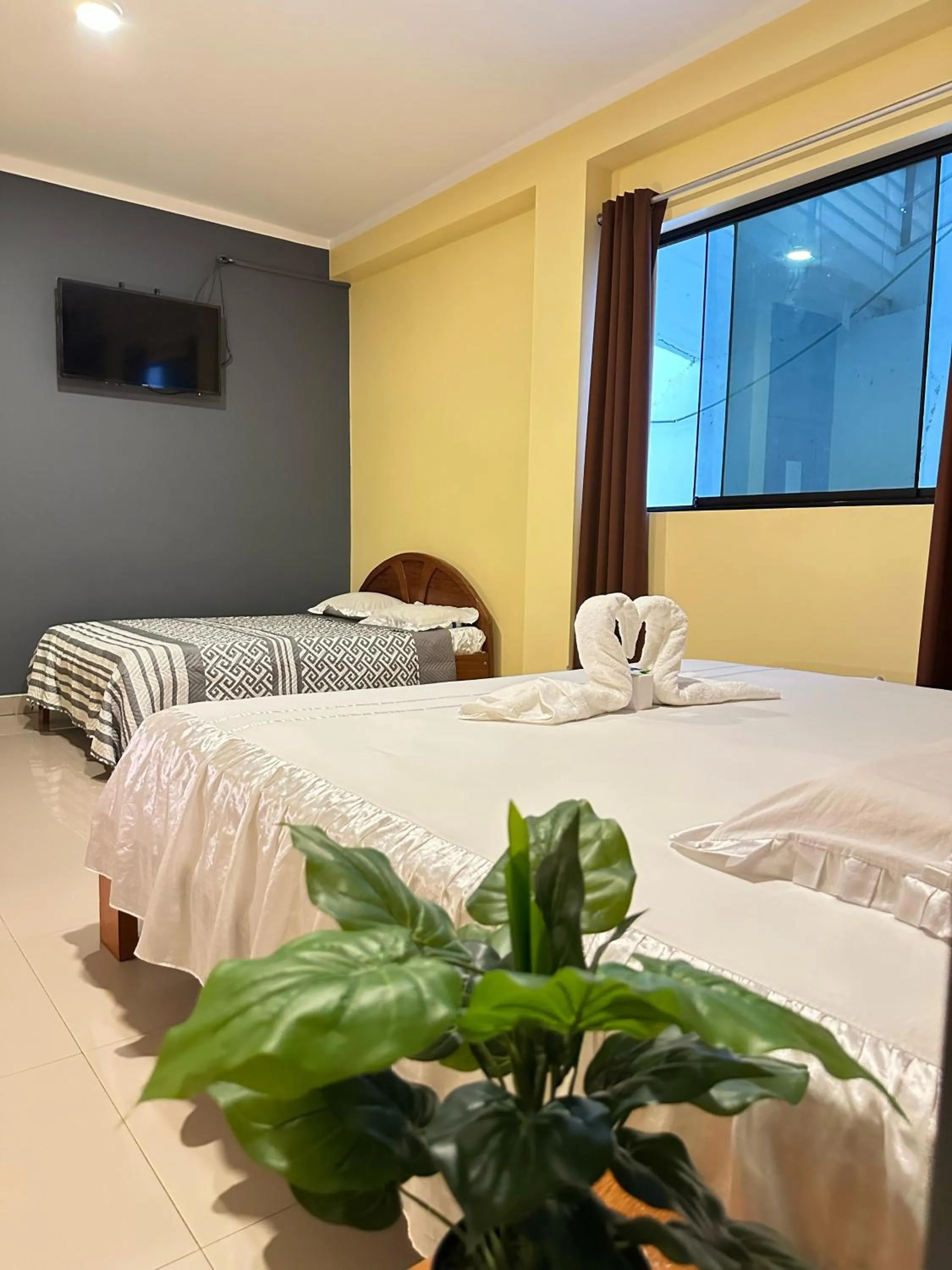 Bed in Hostal Cordillera Azul