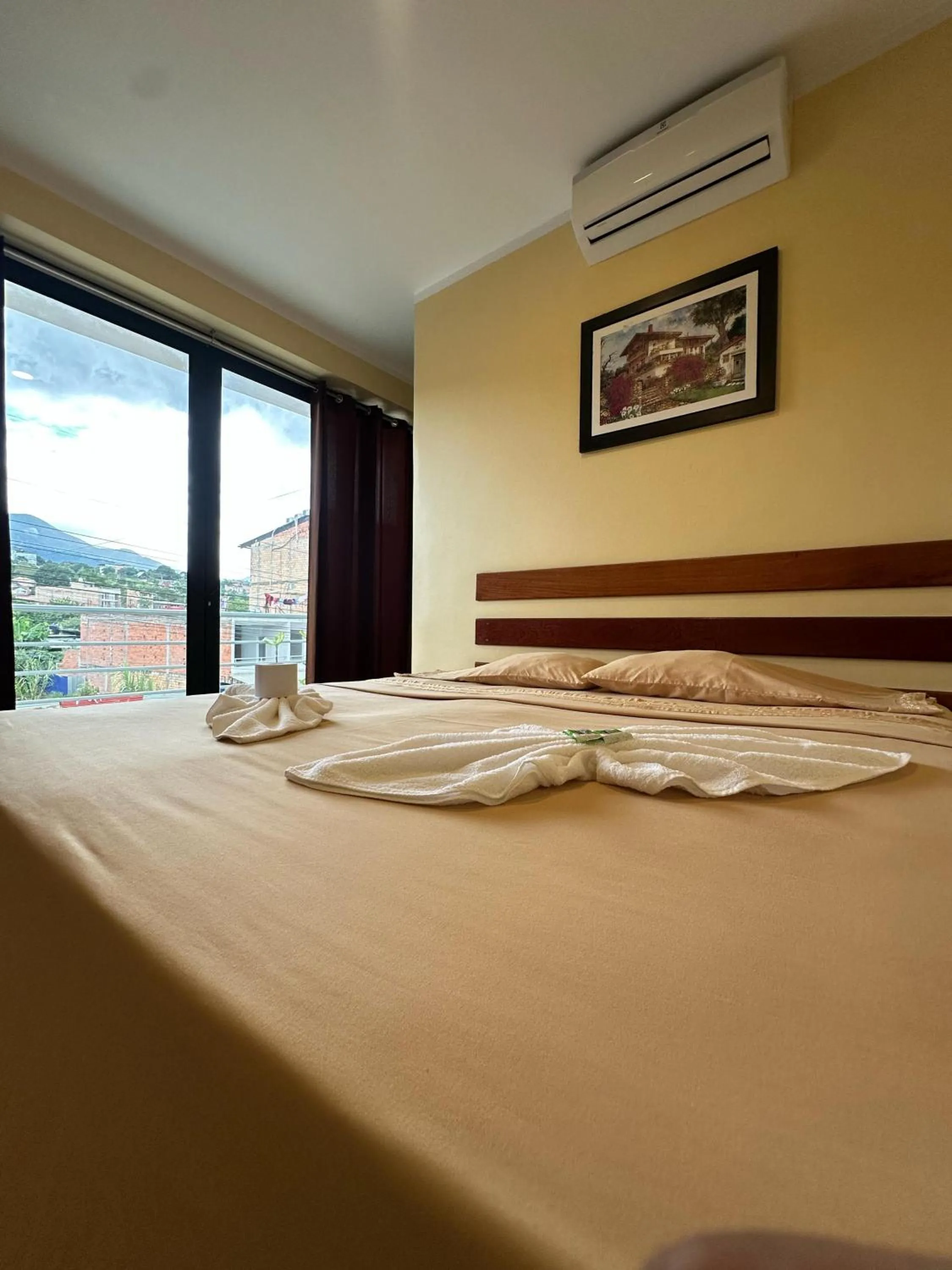 Bed in Hostal Cordillera Azul