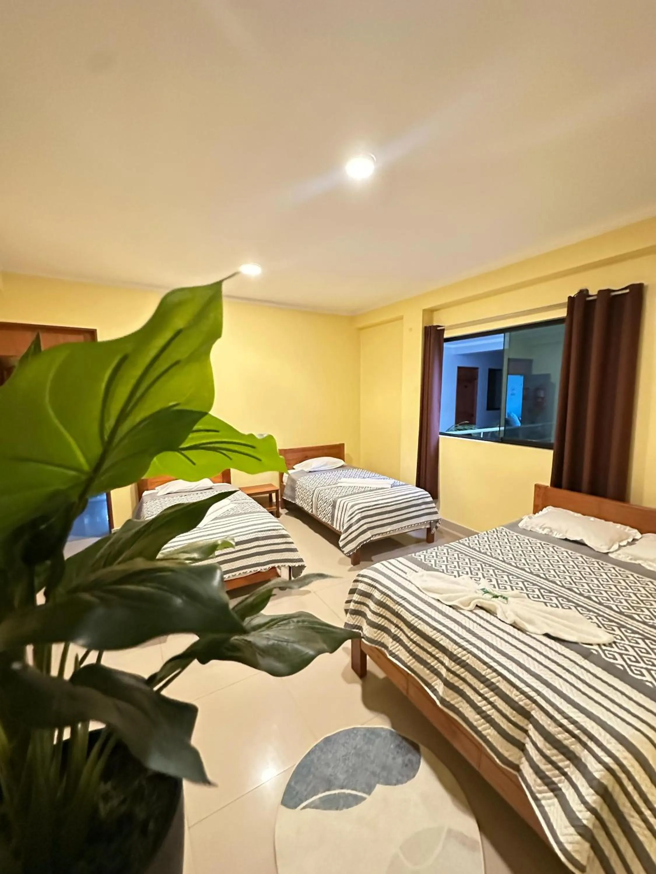 Bed in Hostal Cordillera Azul