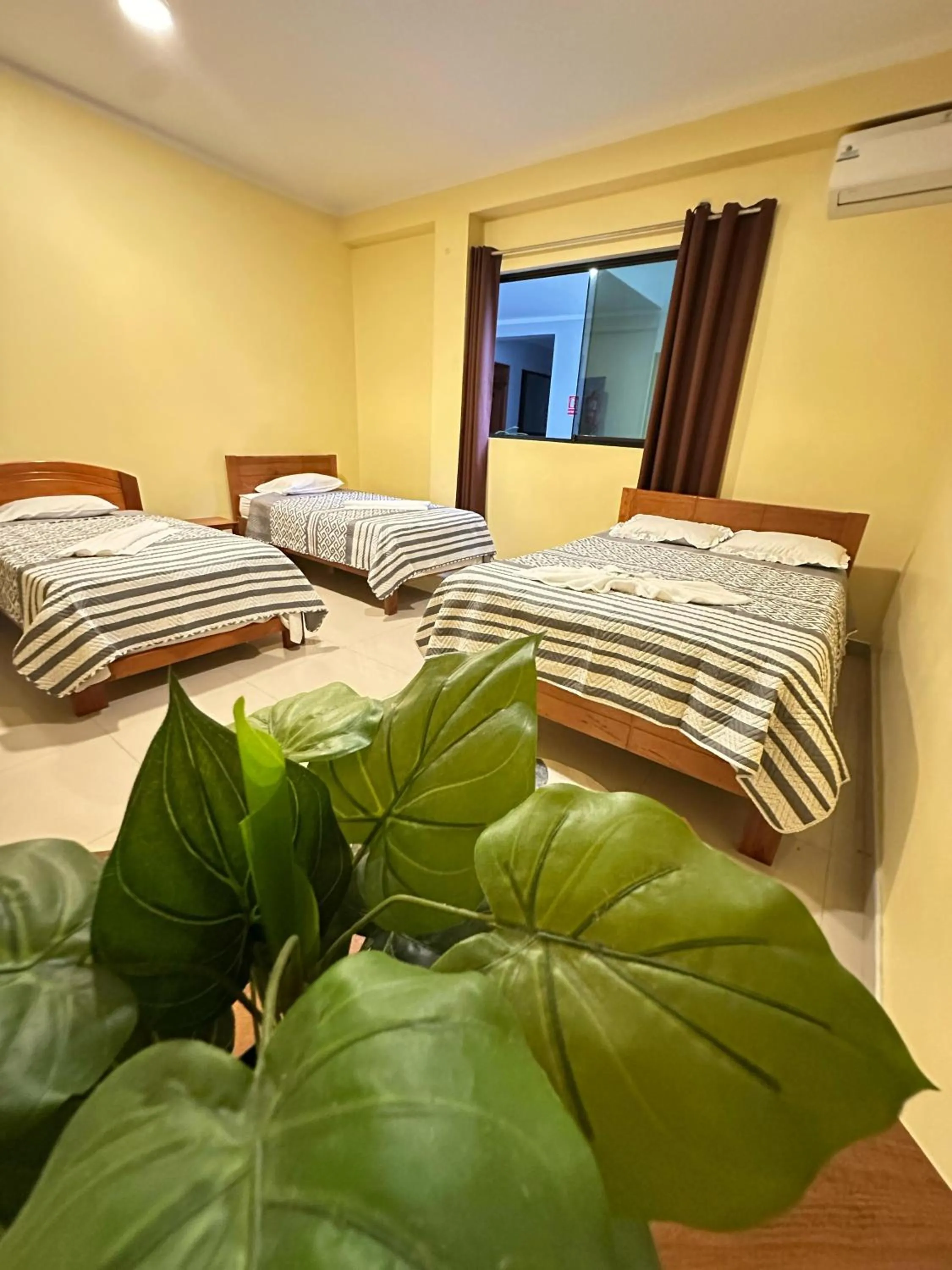 Bed in Hostal Cordillera Azul