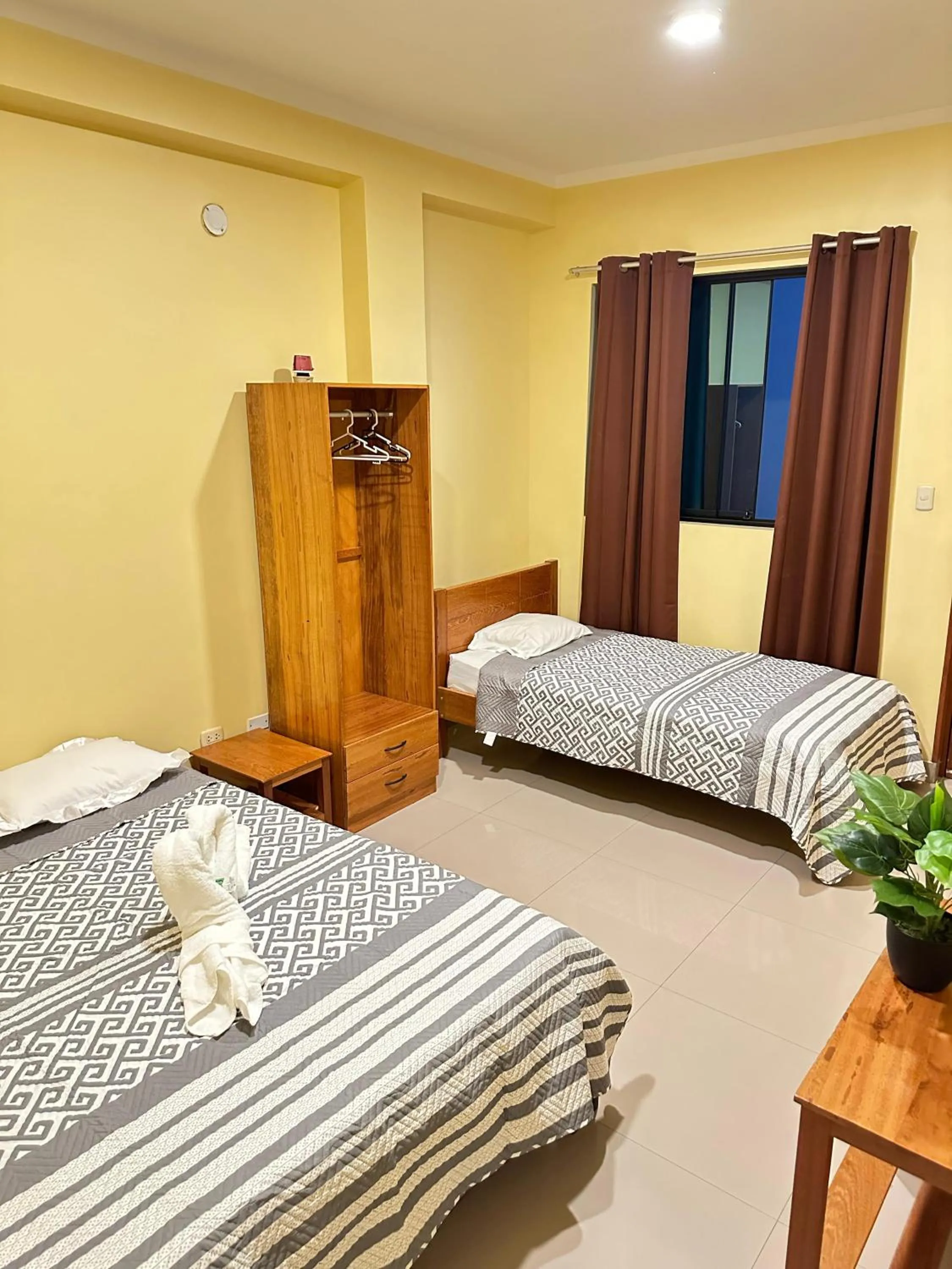 Bed in Hostal Cordillera Azul