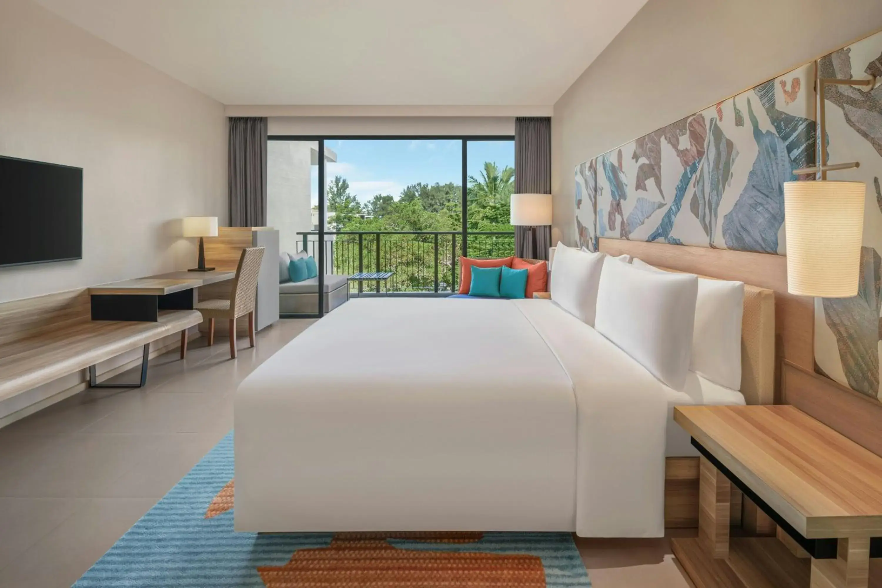 Deluxe King Room with Balcony and Garden View in Le Meridien Phuket Mai Khao Beach Resort Deluxe King Room with Balcony and Garden View in Le Meridien Phuket Mai Khao Beach Resort