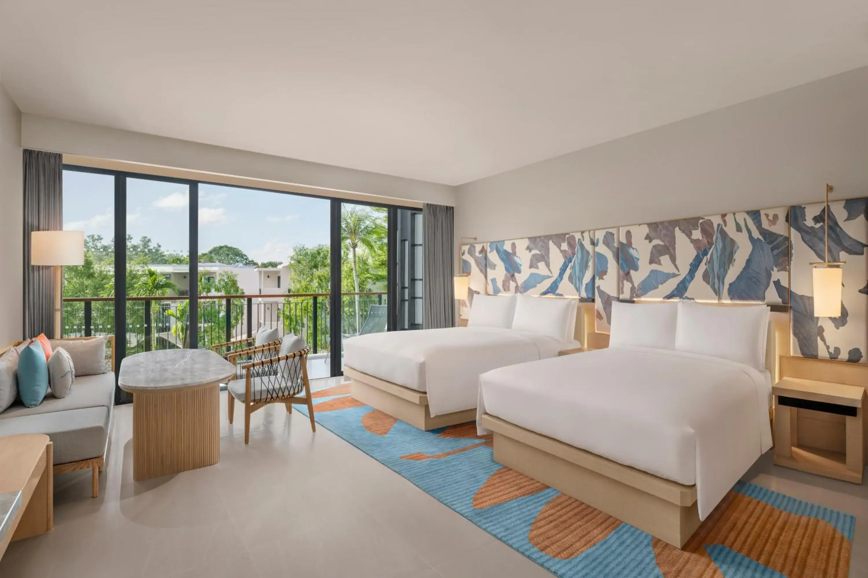 Family Suite with Two Queen Beds and Balcony in Le Meridien Phuket Mai Khao Beach Resort Family Suite with Two Queen Beds and Balcony in Le Meridien Phuket Mai Khao Beach Resort