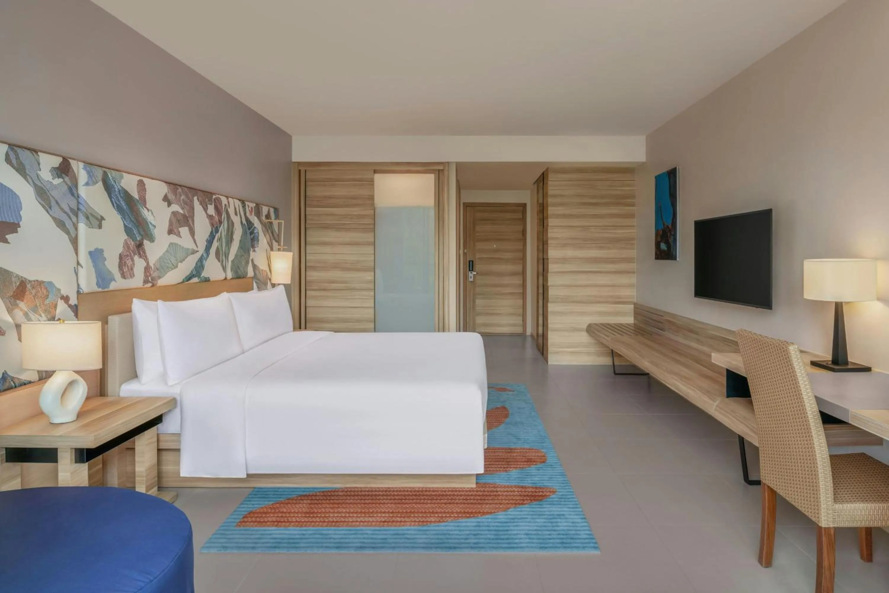 Photo of the whole room, Bed in Le Meridien Phuket Mai Khao Beach Resort