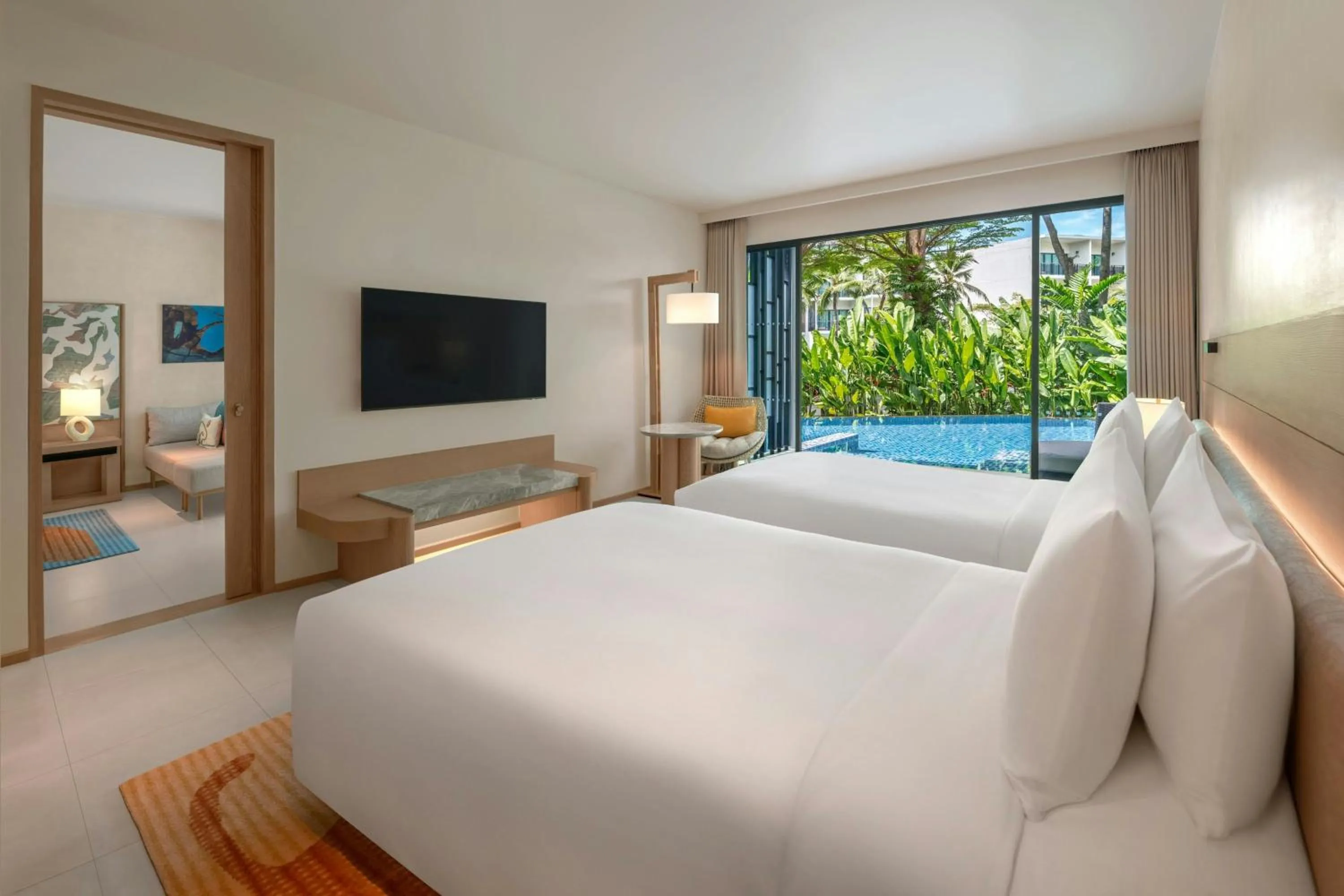 Swimming pool, Bed in Le Meridien Phuket Mai Khao Beach Resort