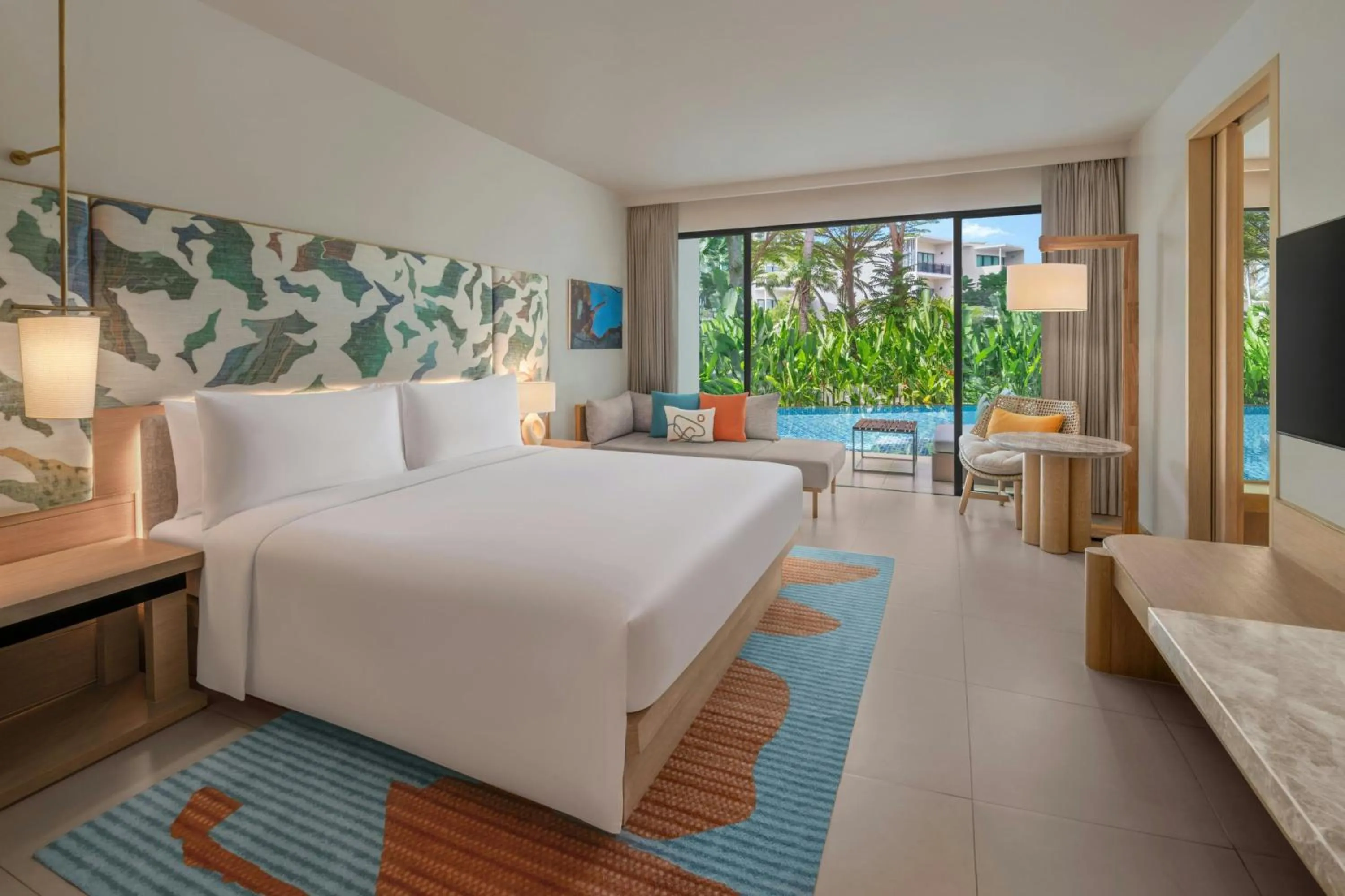 Swimming pool, Bed in Le Meridien Phuket Mai Khao Beach Resort