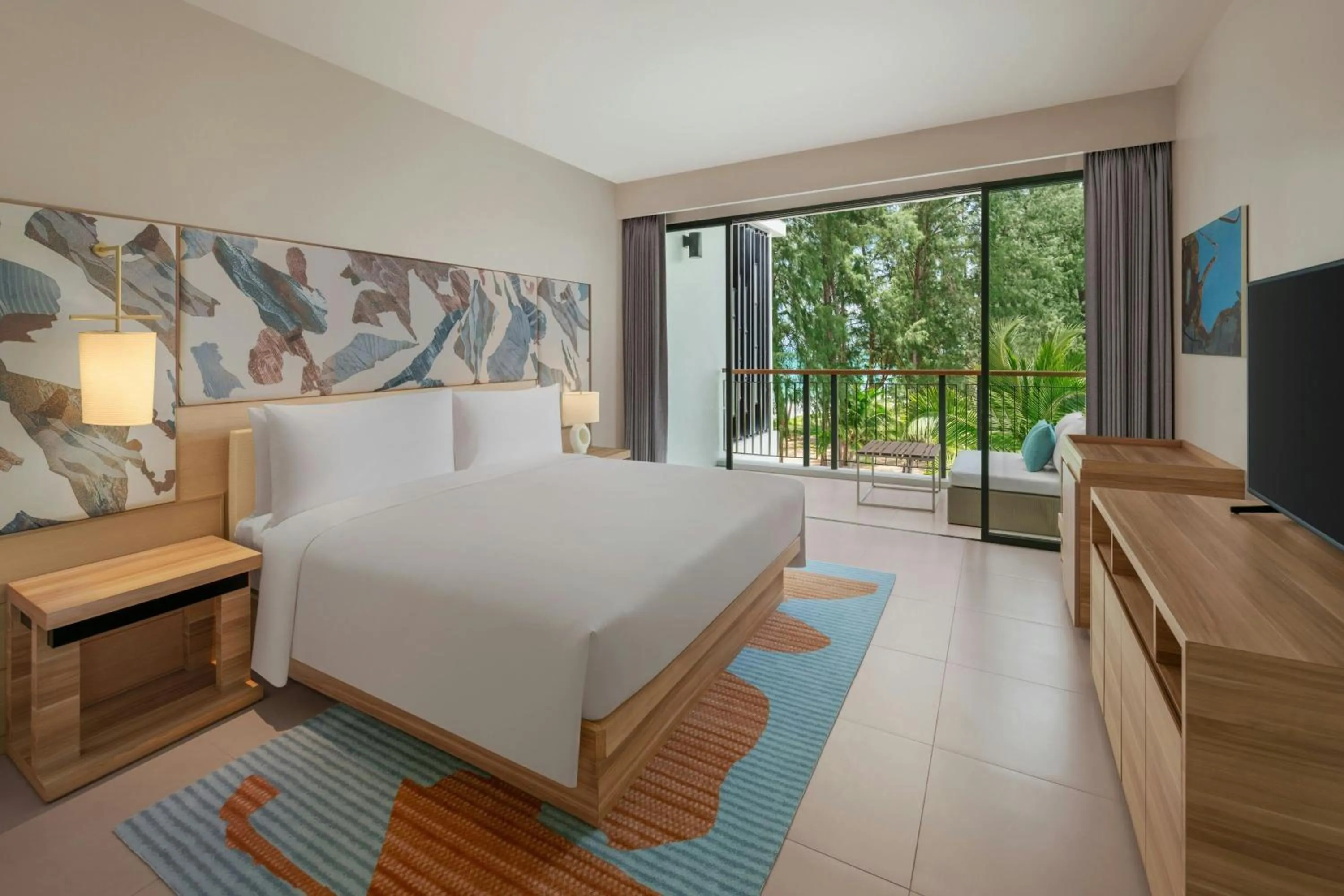 Photo of the whole room, Bed in Le Meridien Phuket Mai Khao Beach Resort