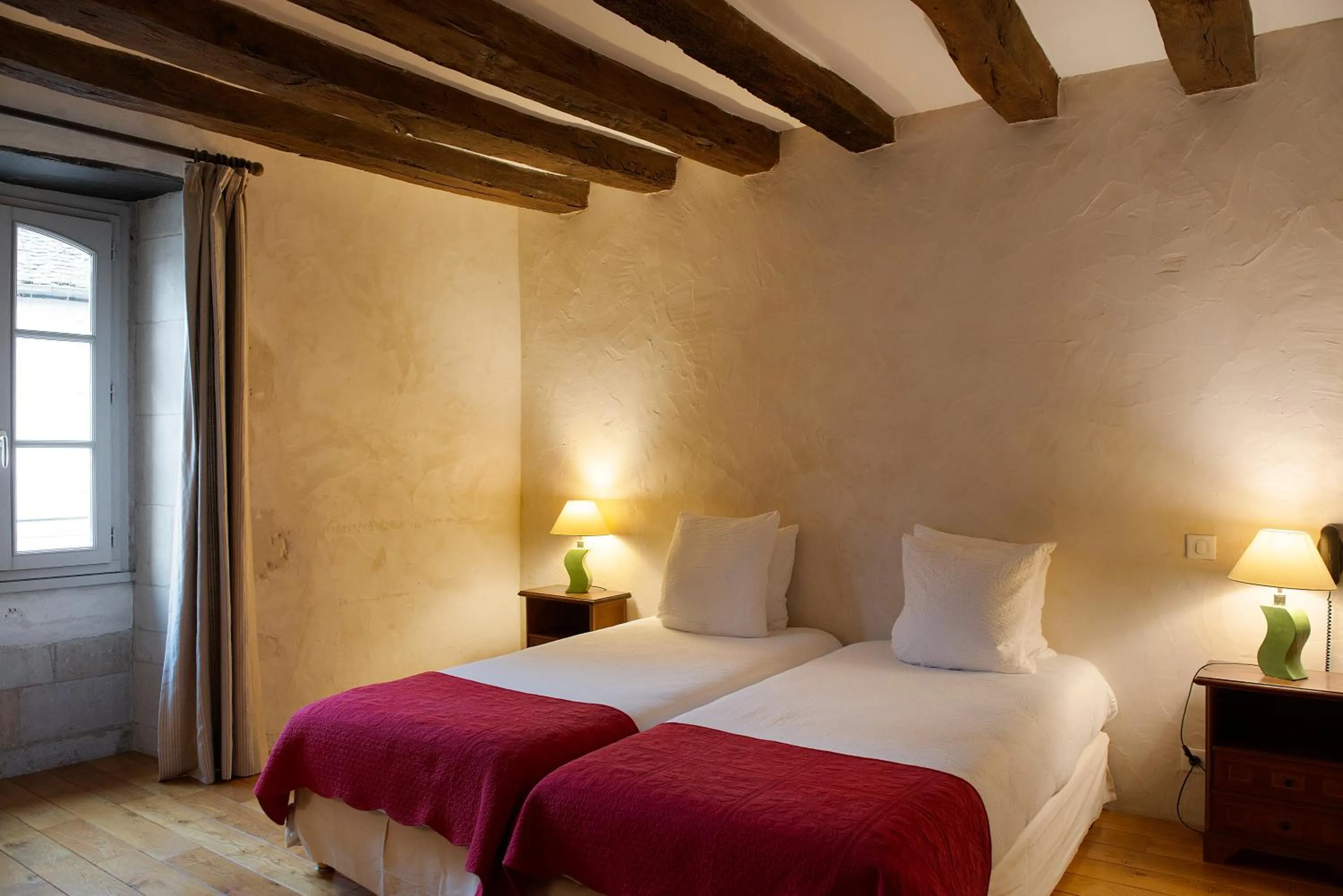 Photo of the whole room, Bed in Logis Hôtel Restaurant Relais de la Mothe