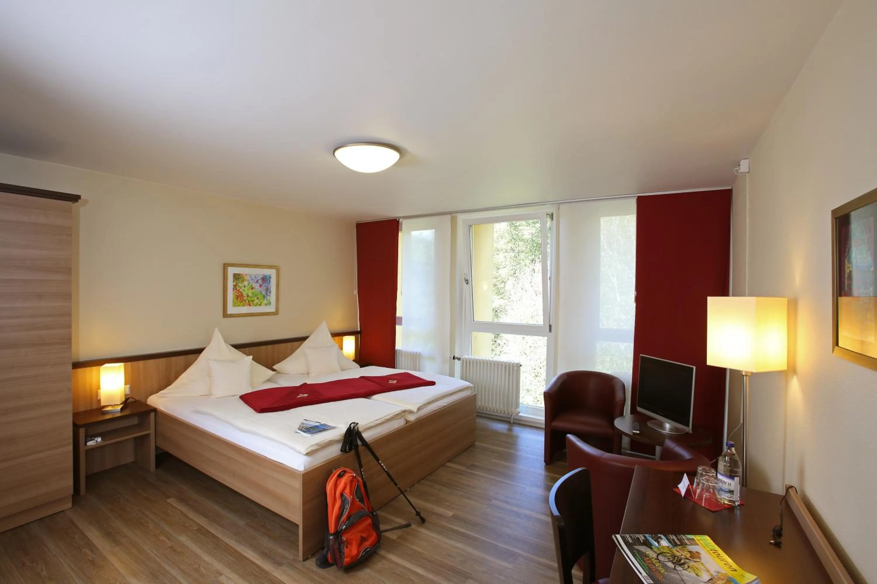 Photo of the whole room, Bed in Tagungshaus Regina Pacis