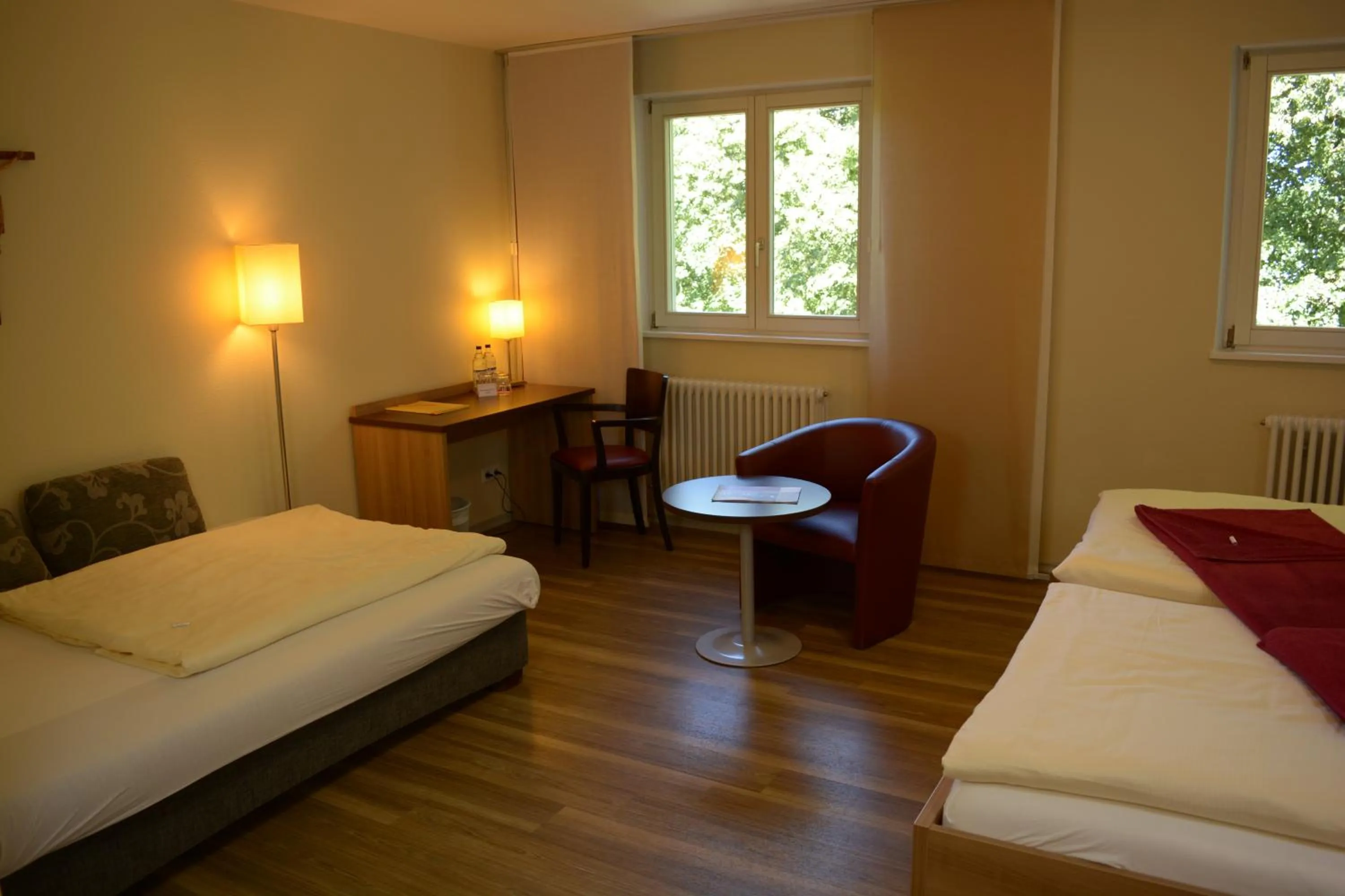Photo of the whole room, Bed in Tagungshaus Regina Pacis