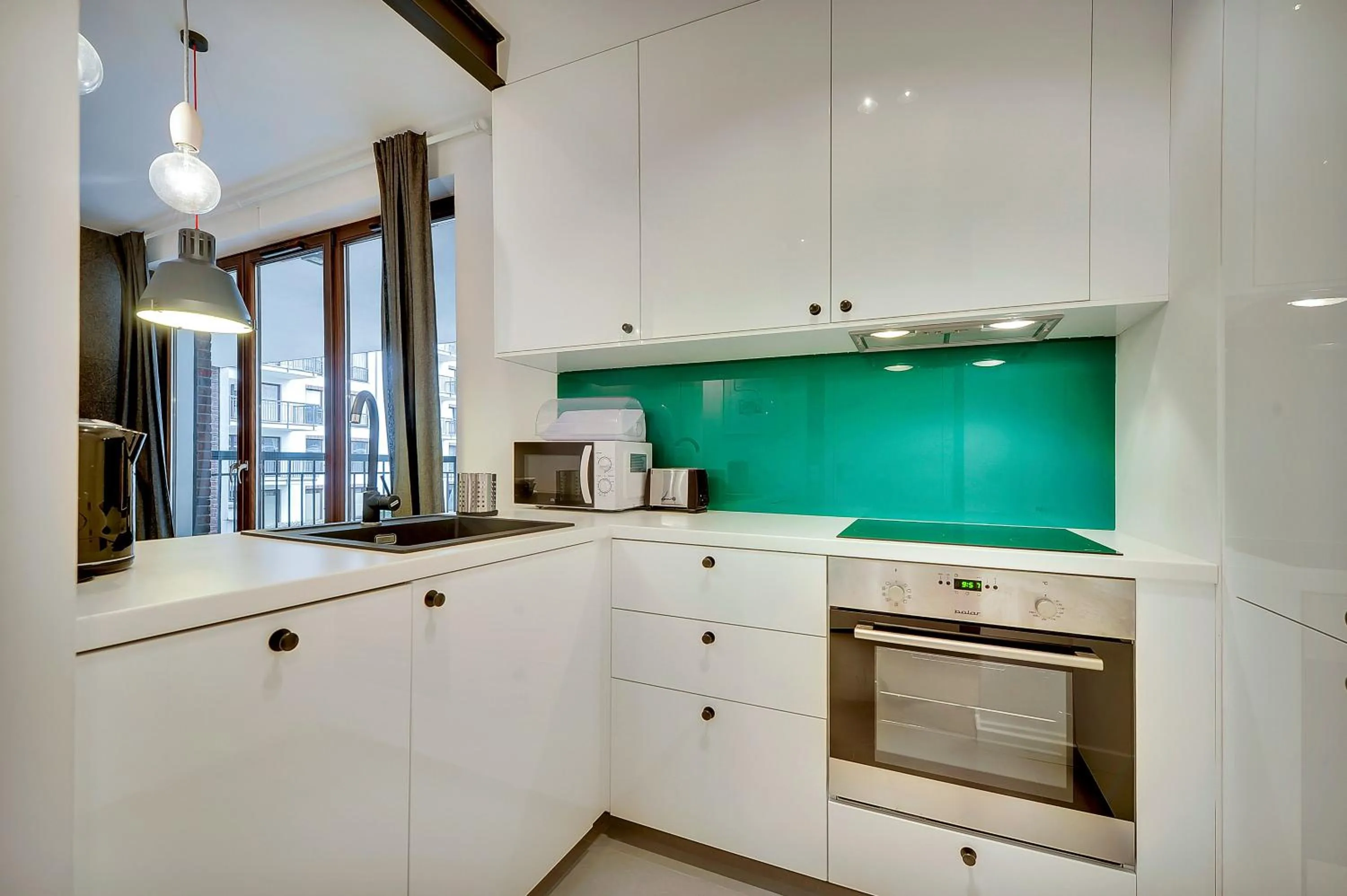 Kitchen or kitchenette in Szafarnia Apartments Old Town