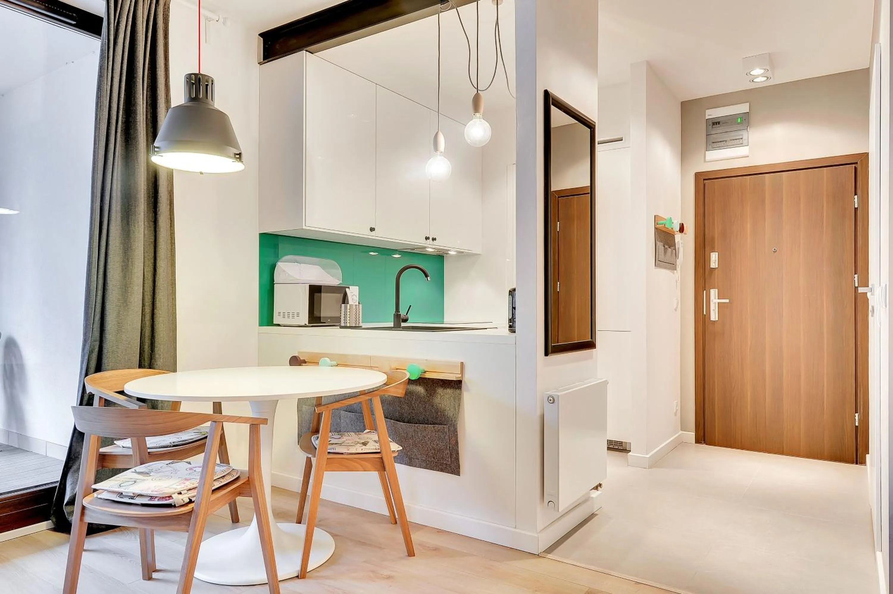 Kitchen or kitchenette in Szafarnia Apartments Old Town