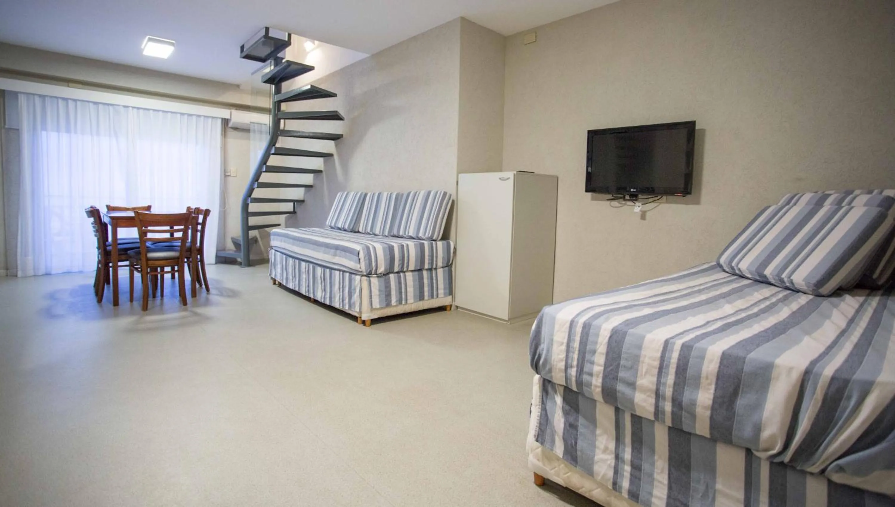 Dining area in Costa Carilo Apart de Mar By HS