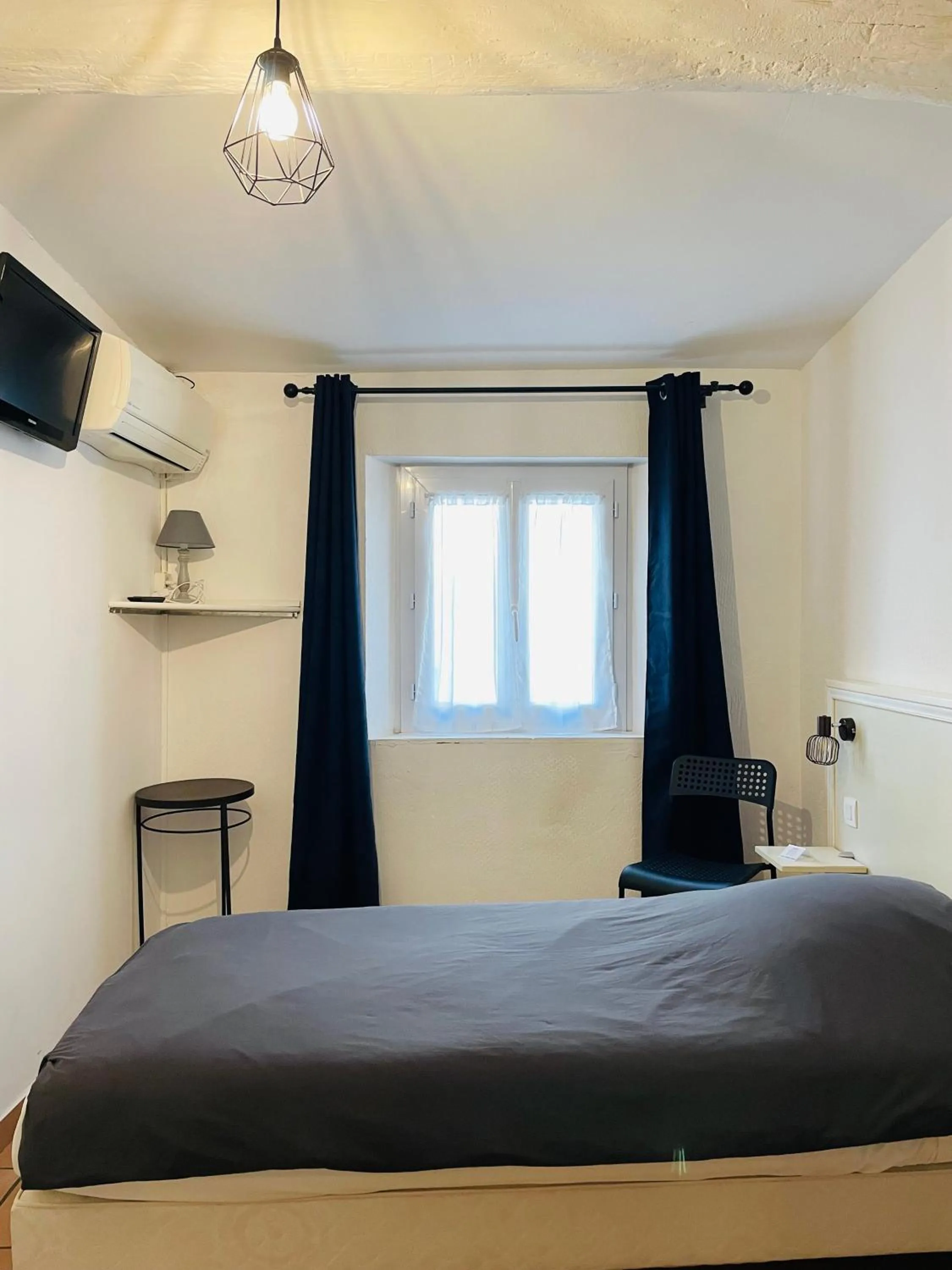 Bed in Hotel Le Flore