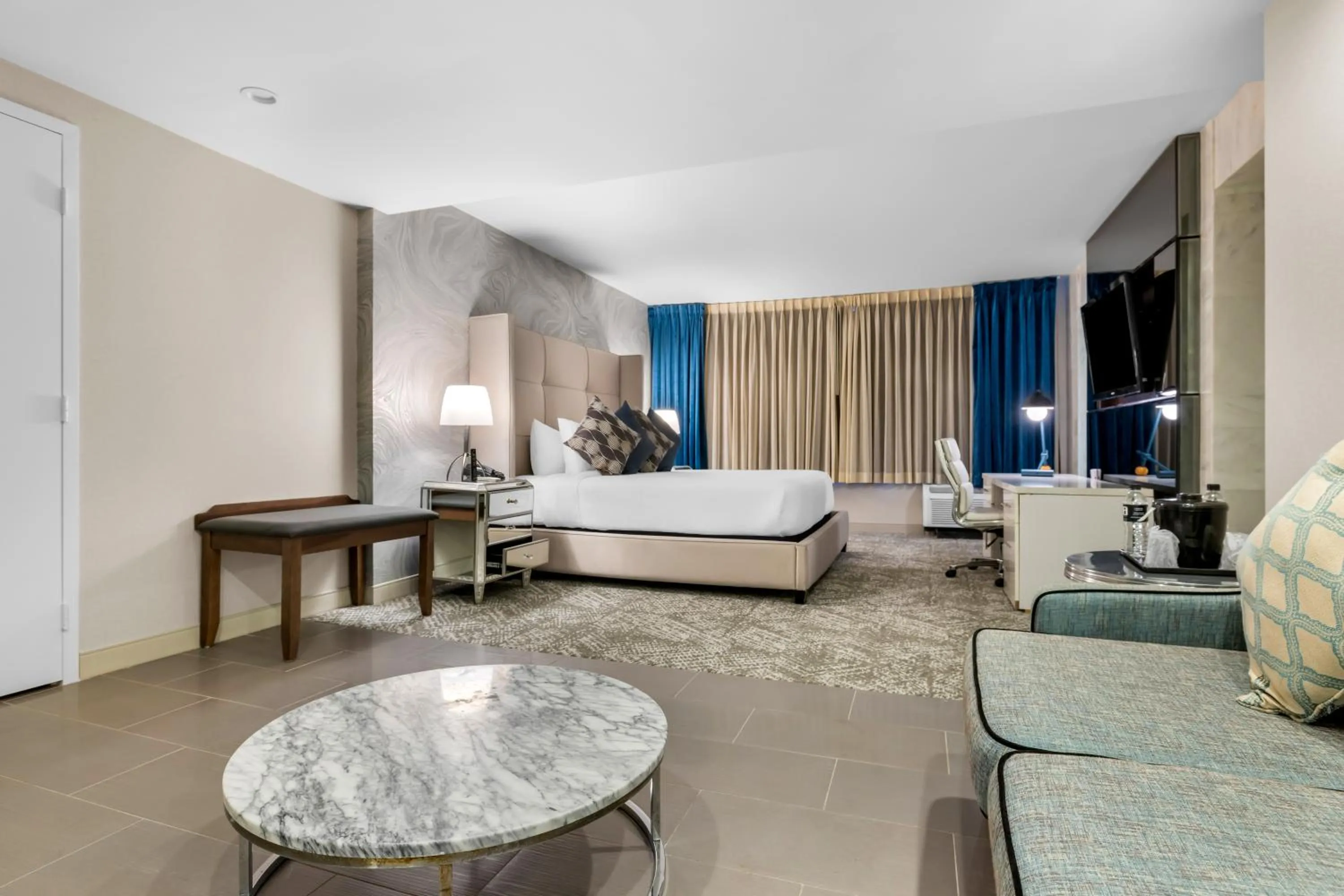 Seating area, Bed in The Hills Hotel, an IHG Hotel