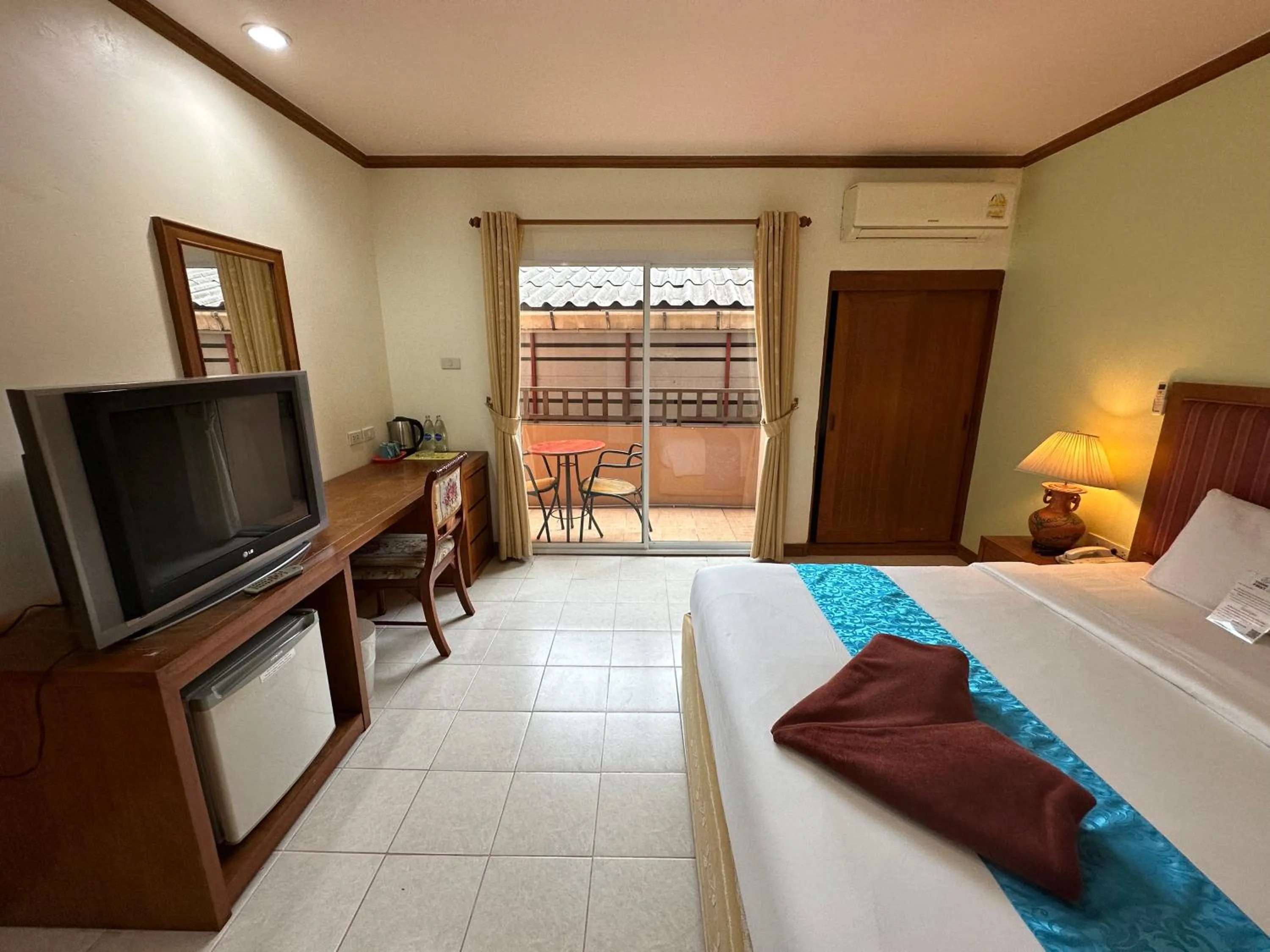 Photo of the whole room, Bed in Thipurai Beach Hotel