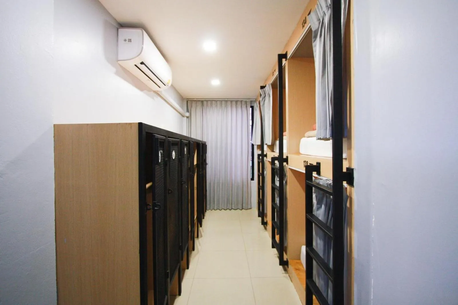 Bed in 18 Coins Budget Hotel