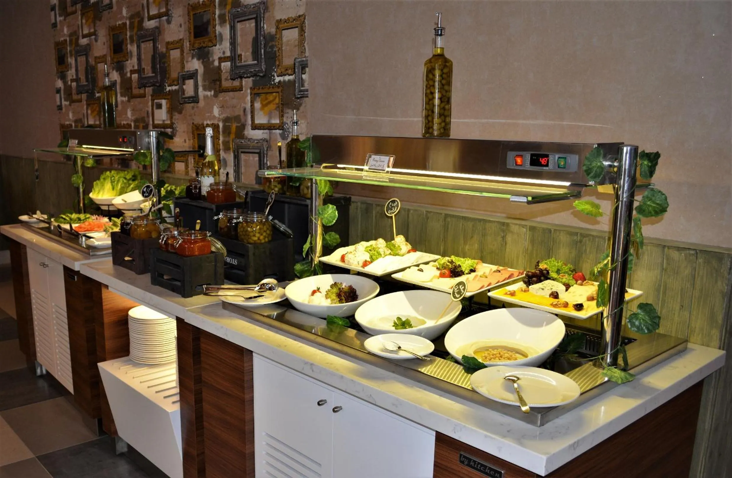 Buffet breakfast in Makeen Homes by Warwick Hotel