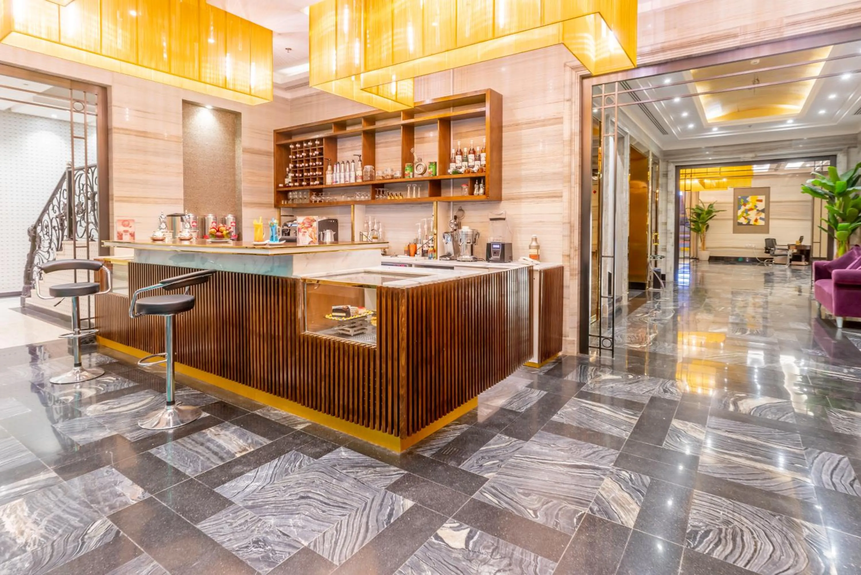 Lounge or bar in Makeen Homes by Warwick Hotel