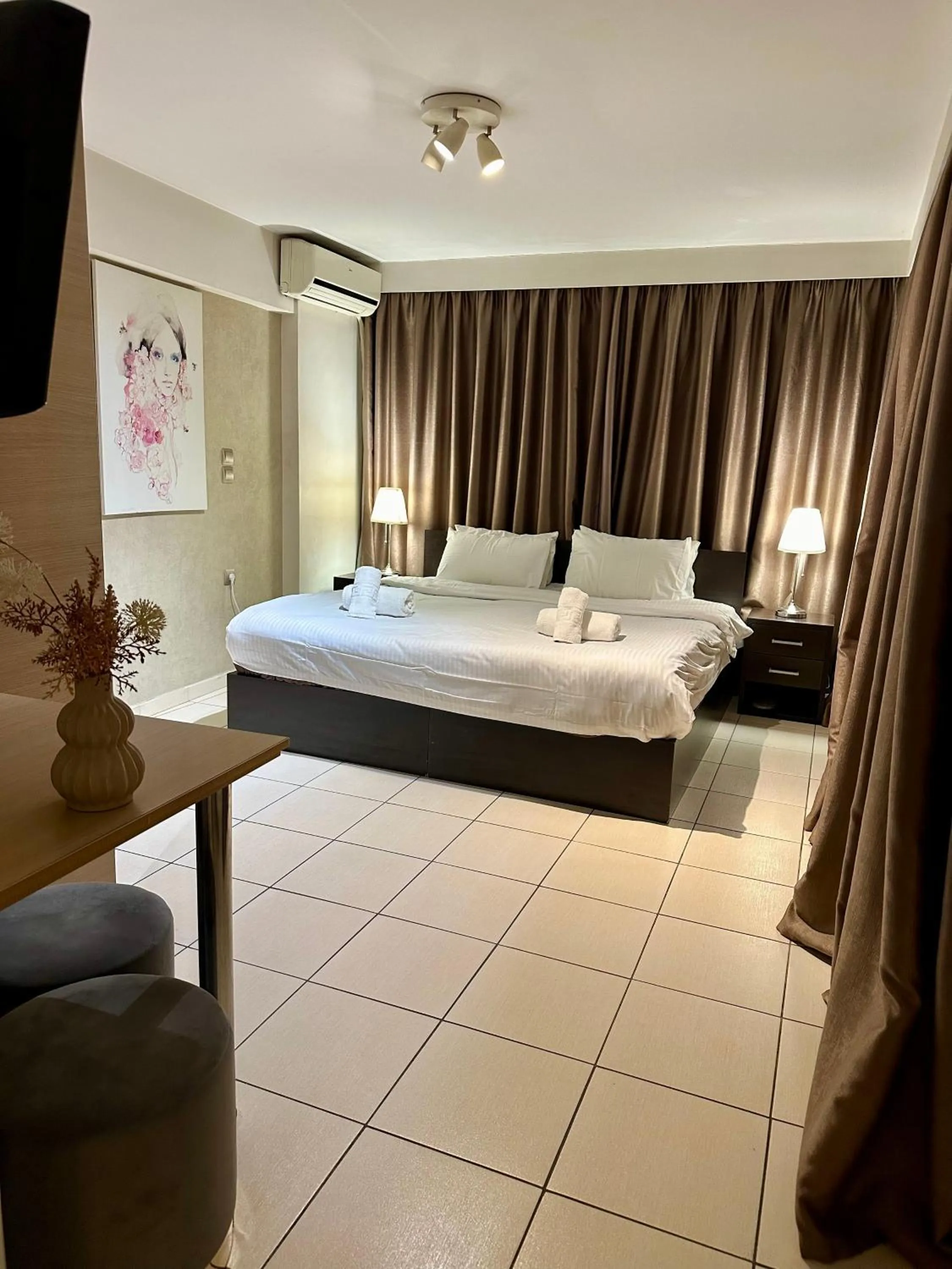 Bed in Mc Queen Rooms & Apartments