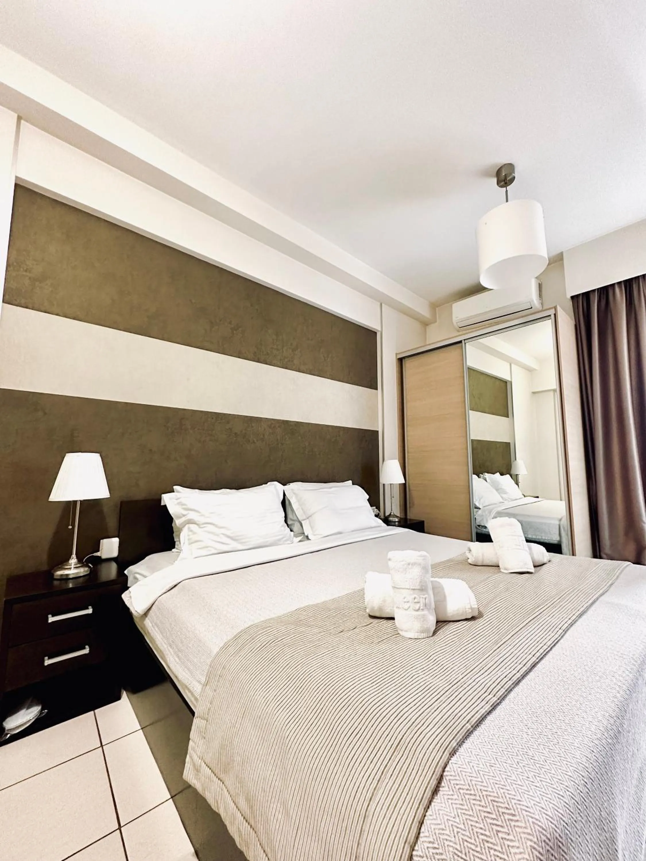 Bed in Mc Queen Rooms & Apartments