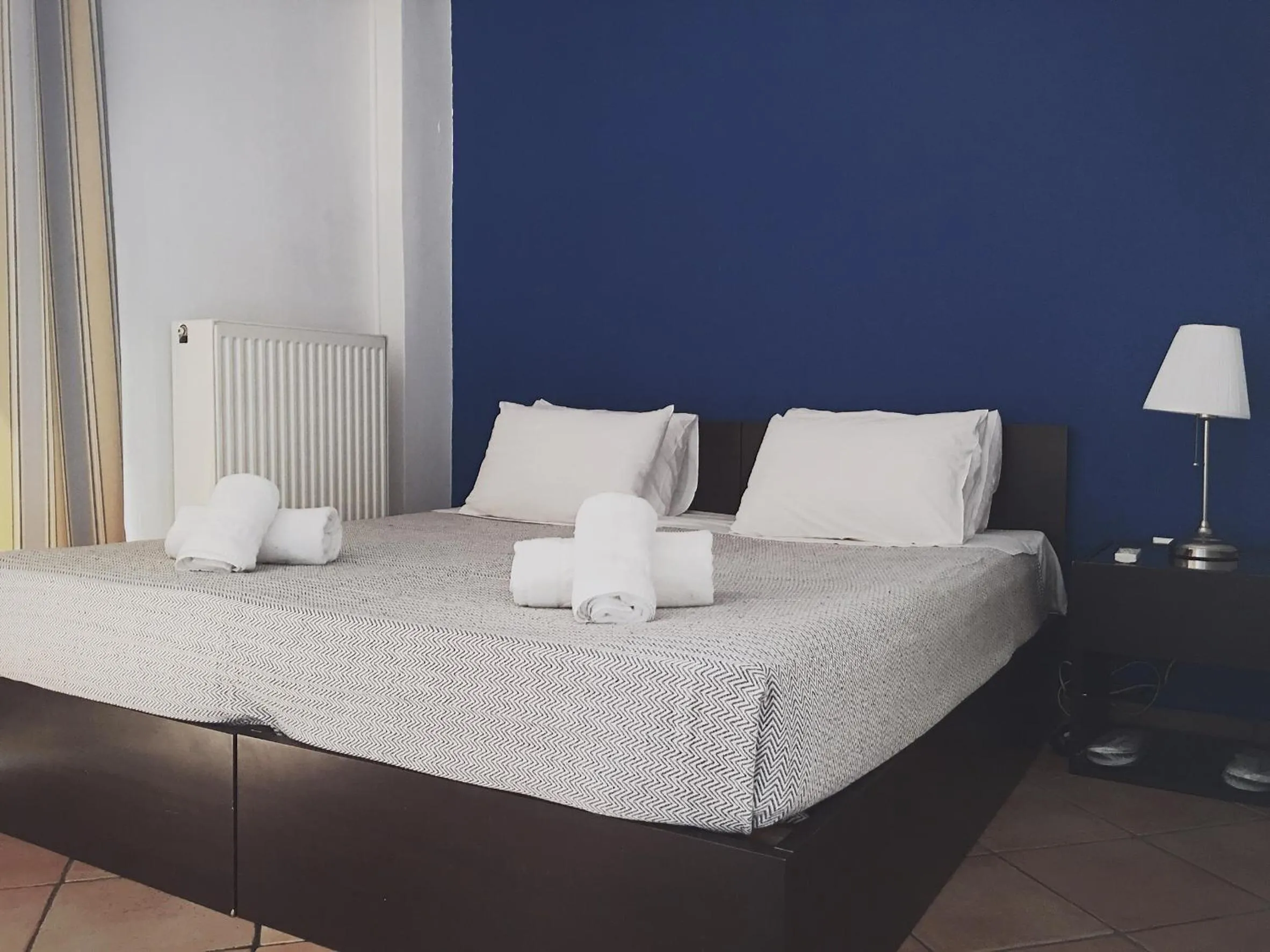 Photo of the whole room, Bed in Mc Queen Rooms & Apartments