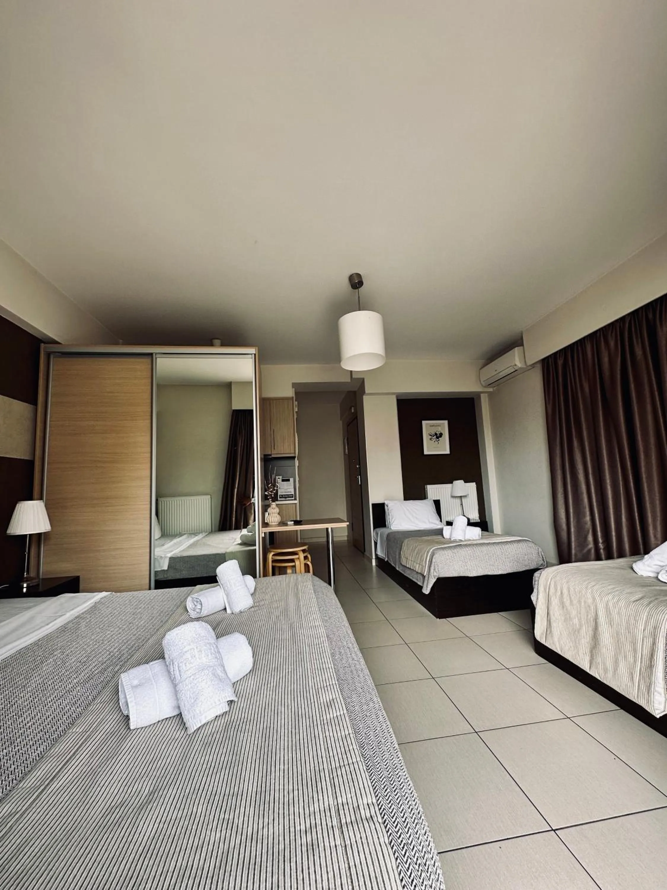 Bed in Mc Queen Rooms & Apartments