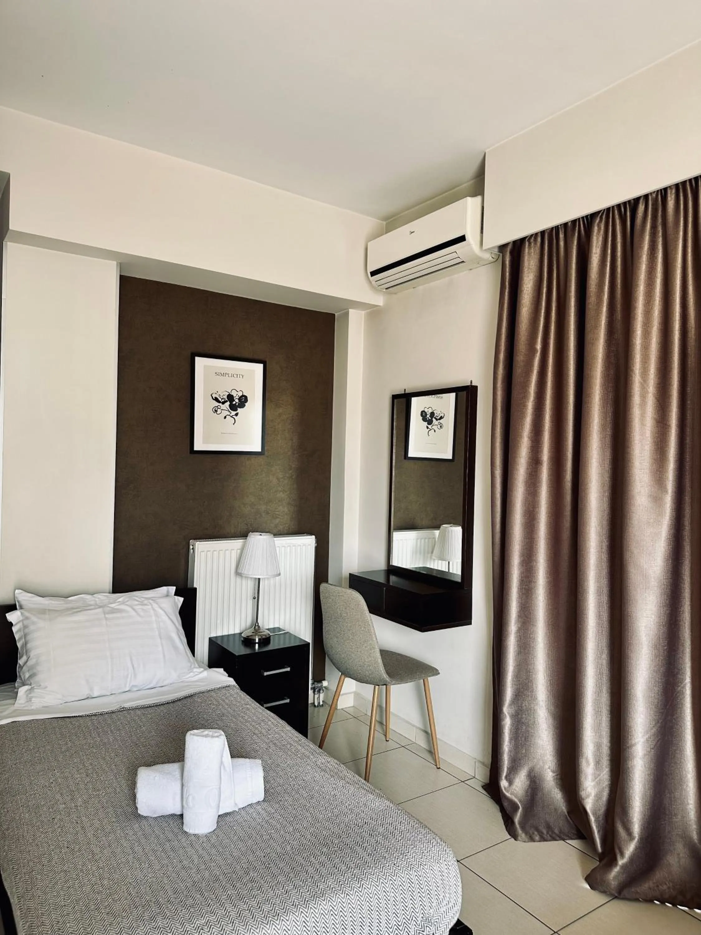 Bed in Mc Queen Rooms & Apartments