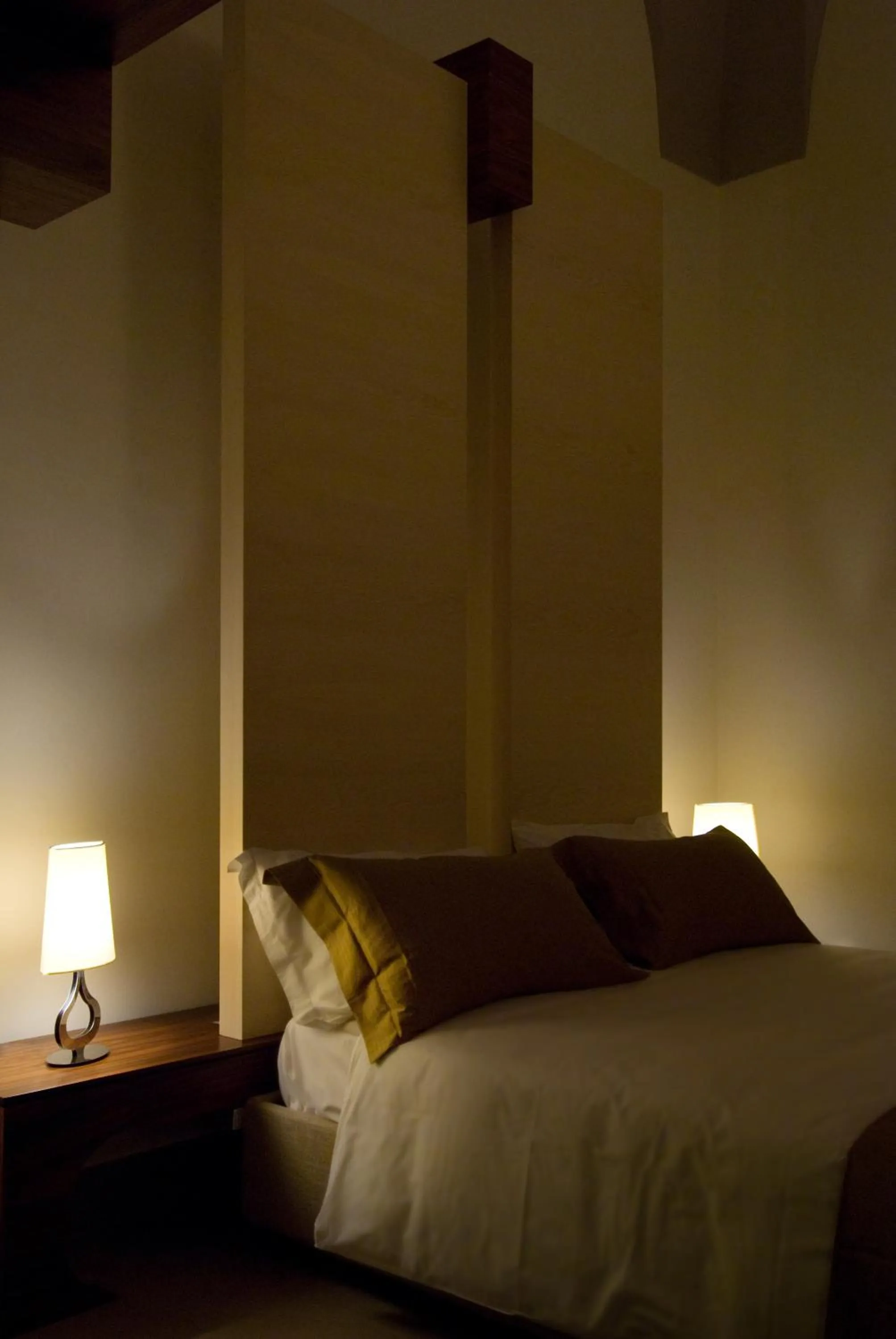 Bed in Alvino Suite And Breakfast