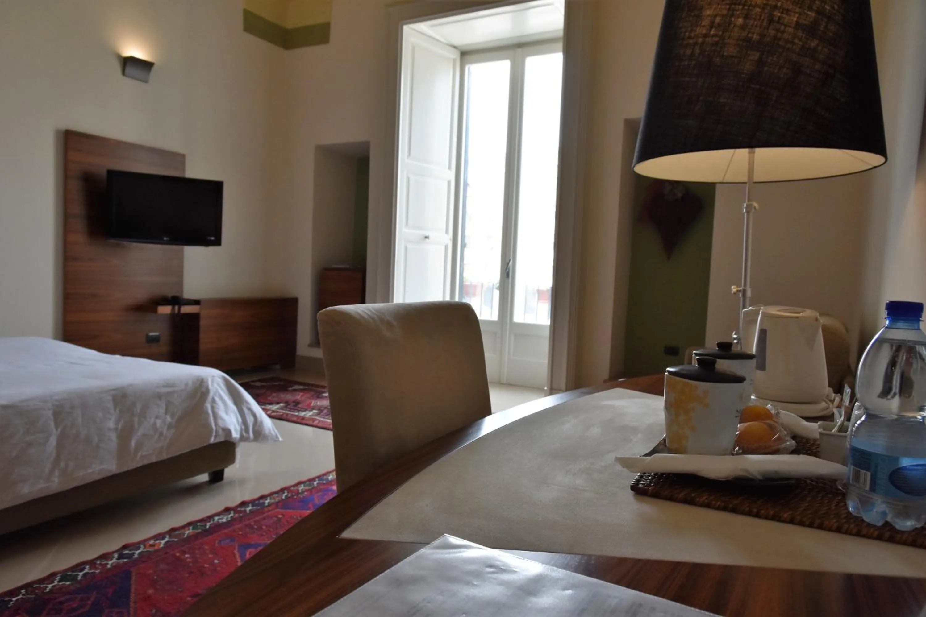 Bed in Alvino Suite And Breakfast