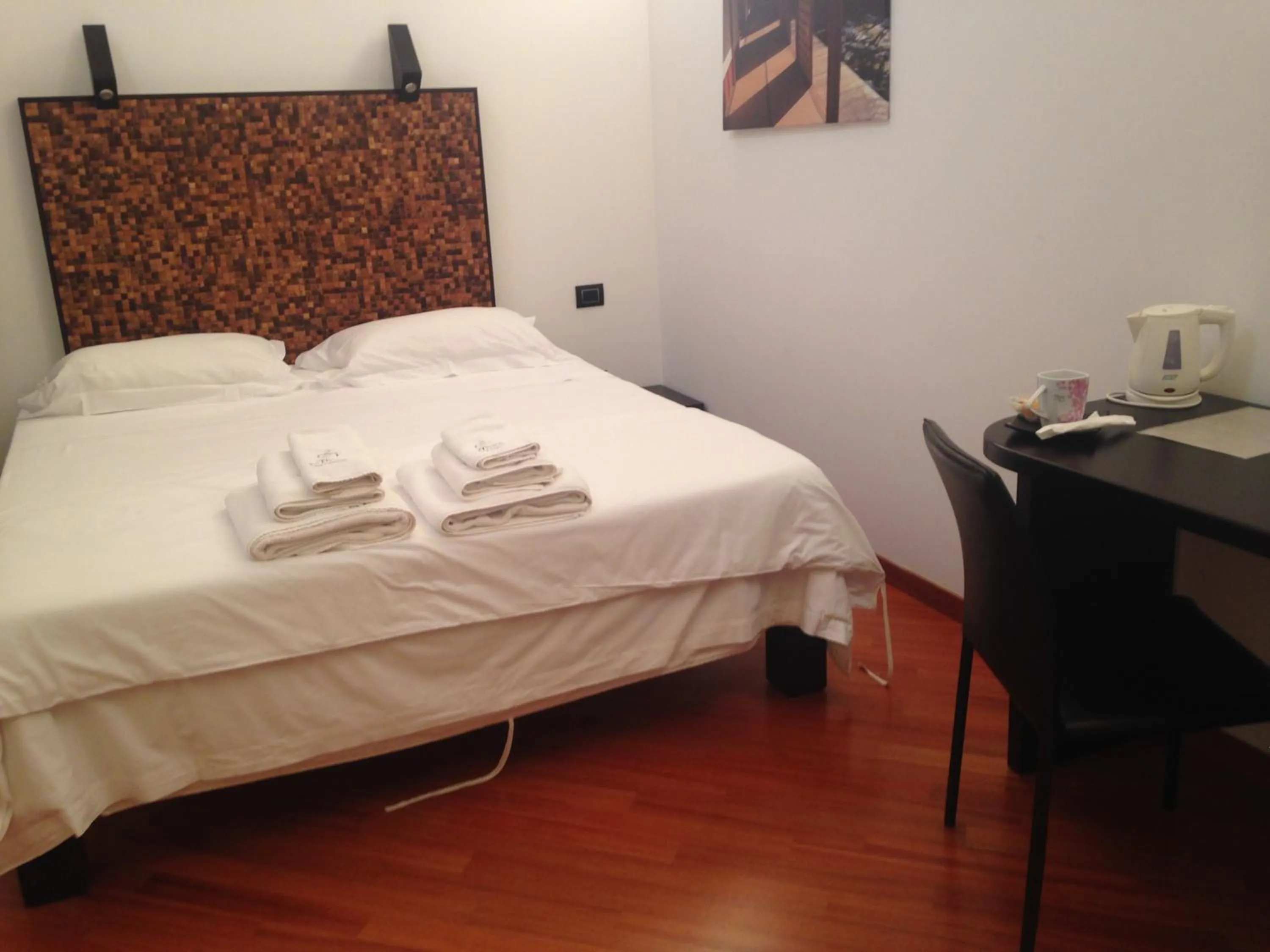 Bed in Alvino Suite And Breakfast