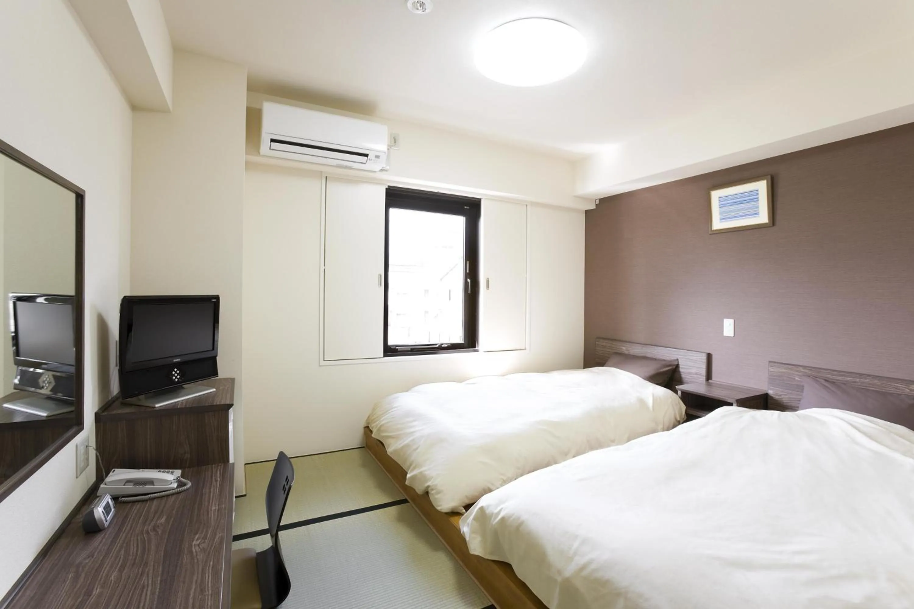 Photo of the whole room, Bed in The Kato Hotel