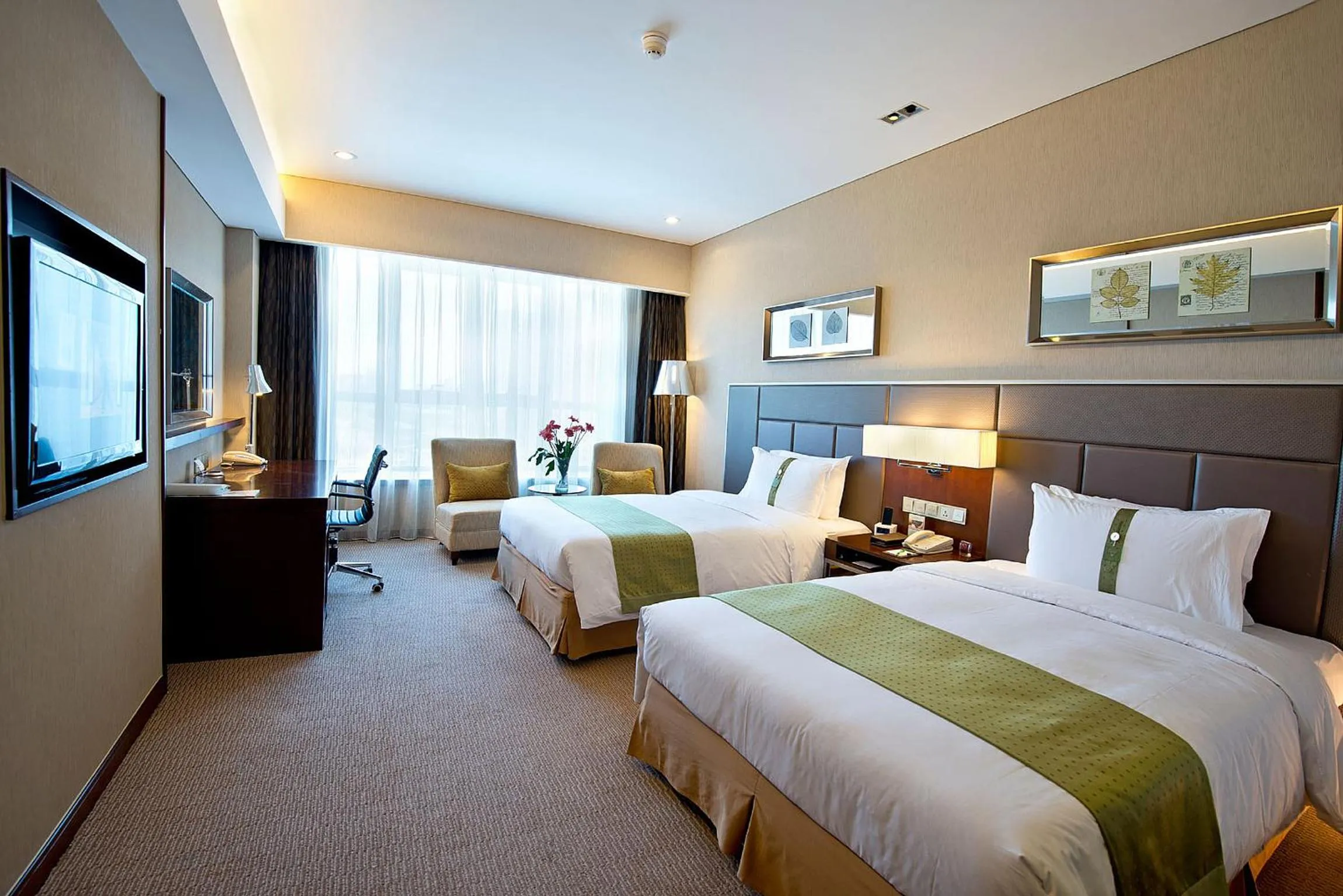 Bed in Holiday Inn Beijing Haidian, an IHG Hotel