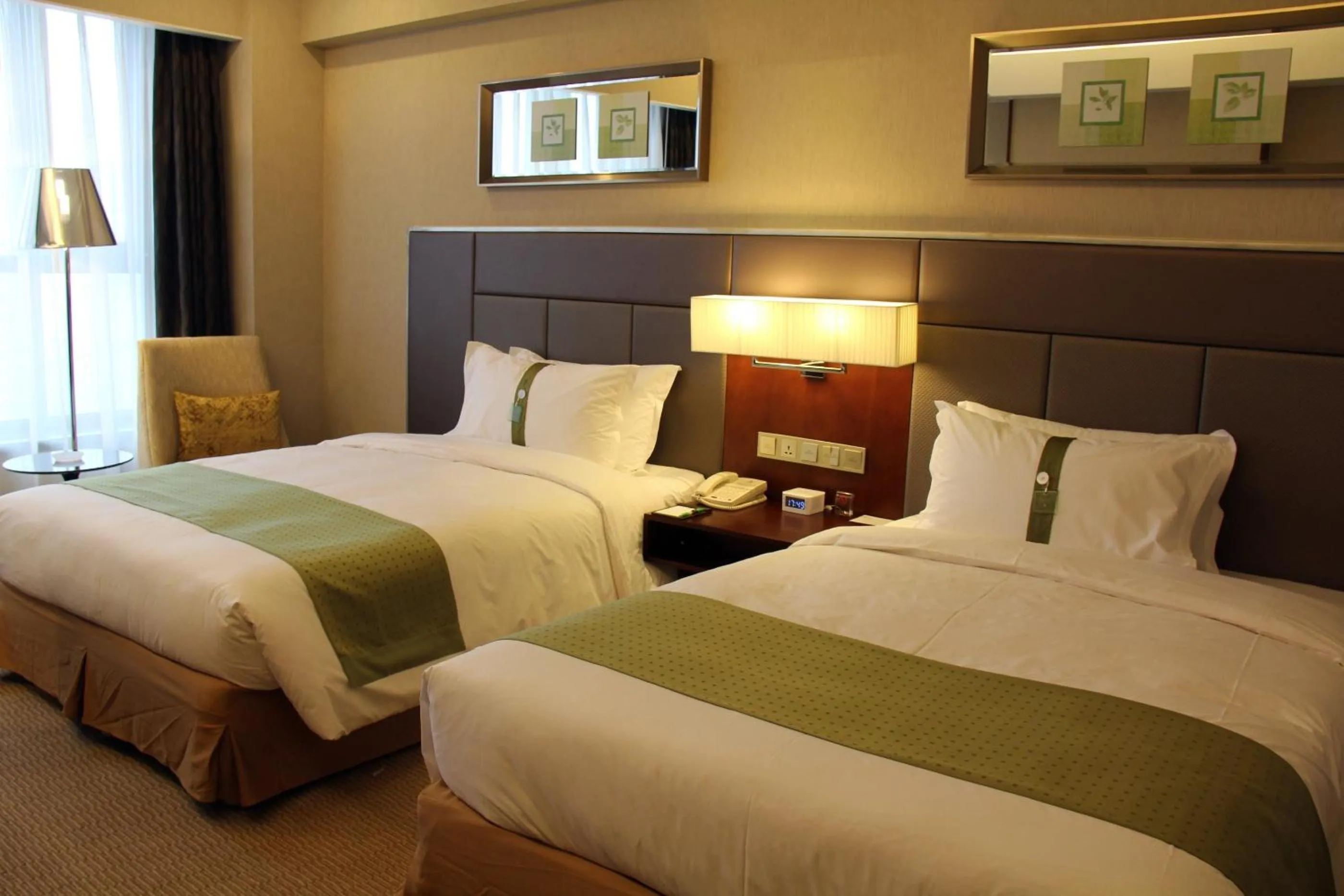 Bed in Holiday Inn Beijing Haidian, an IHG Hotel