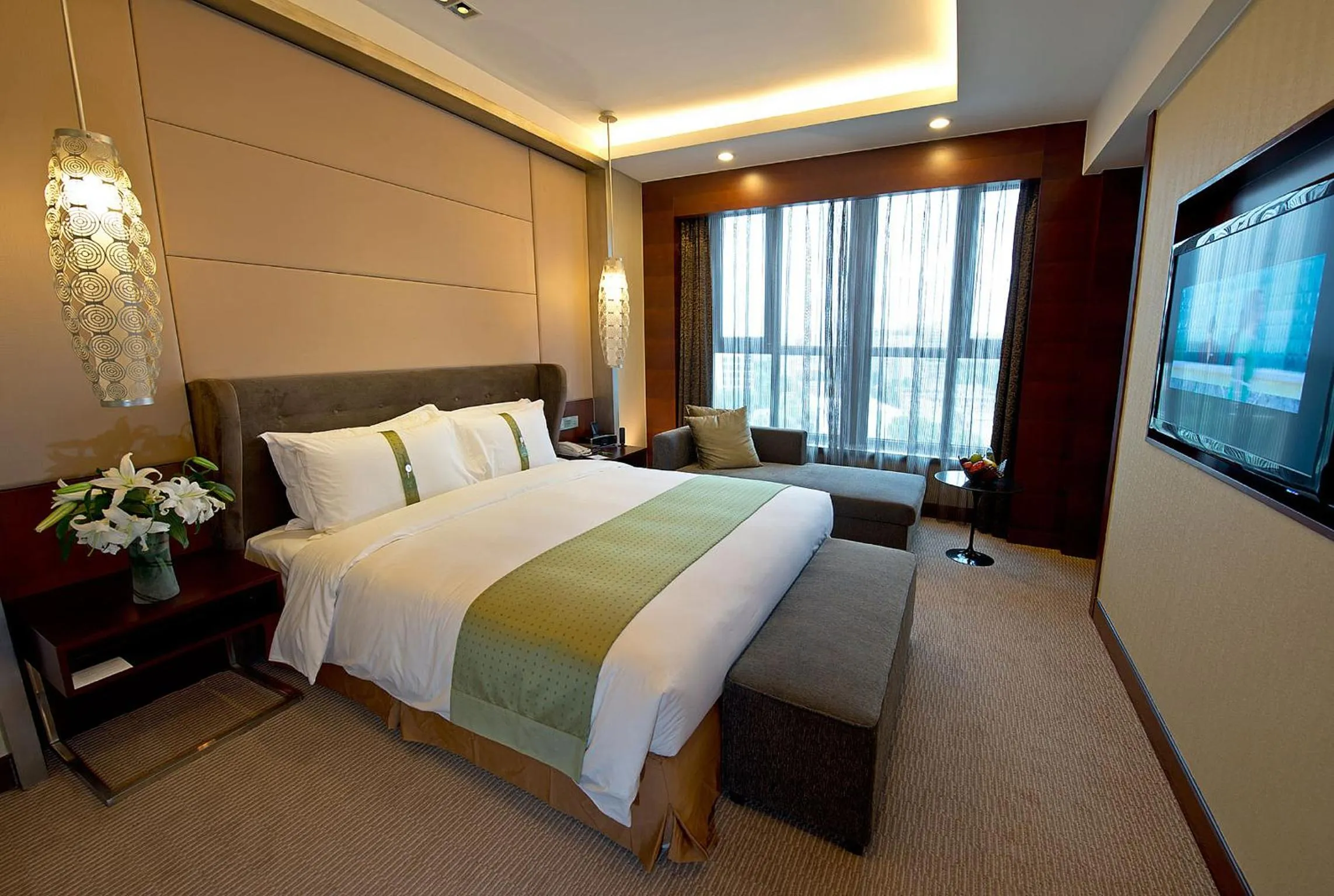 Bed in Holiday Inn Beijing Haidian, an IHG Hotel