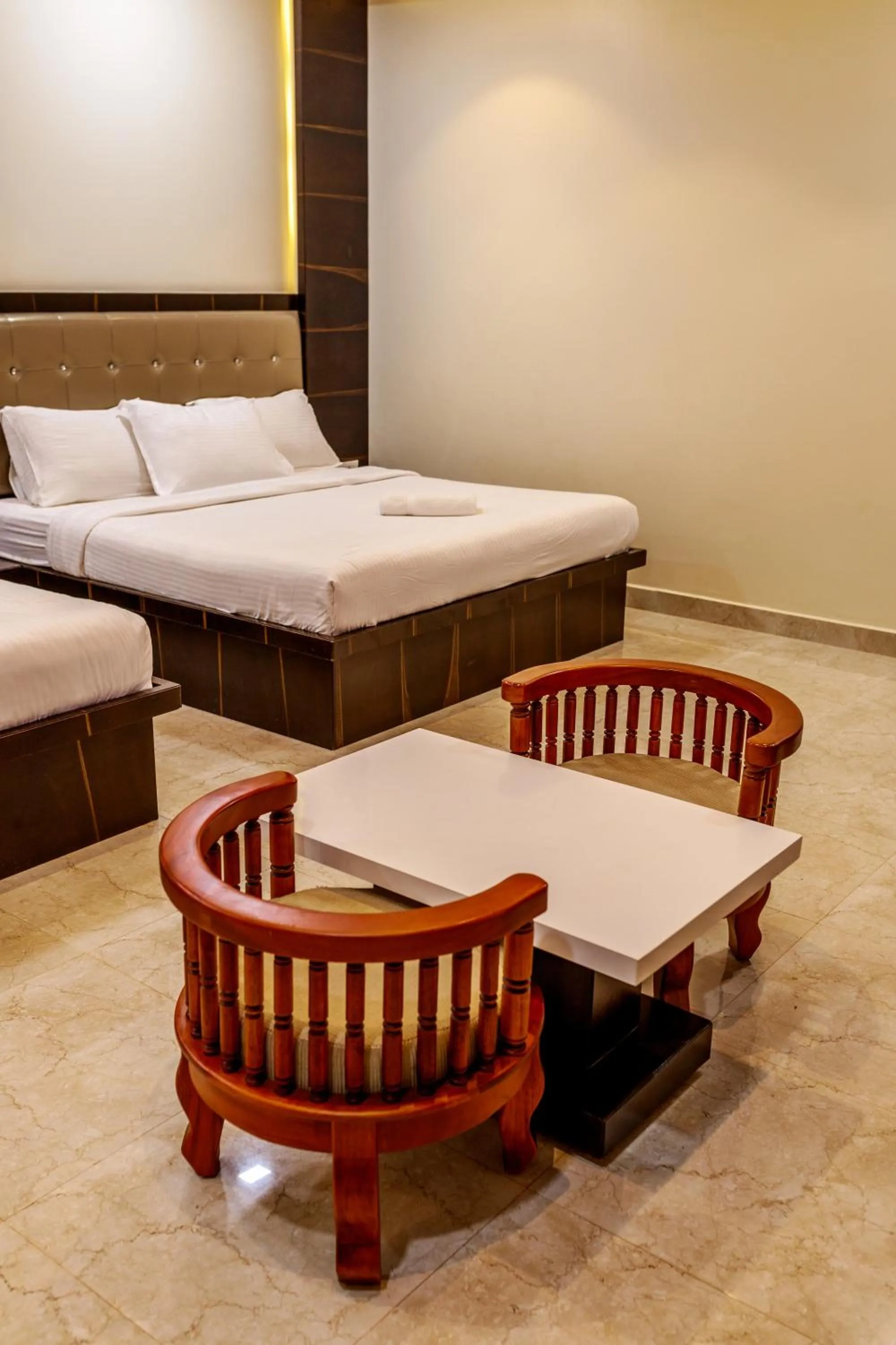 Seating area, Bed in SR Jungle Resort