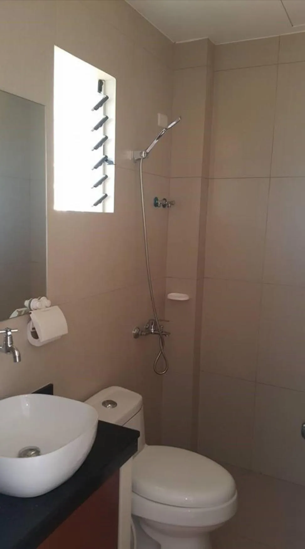 Toilet in SLAM'S Garden Dive Resort