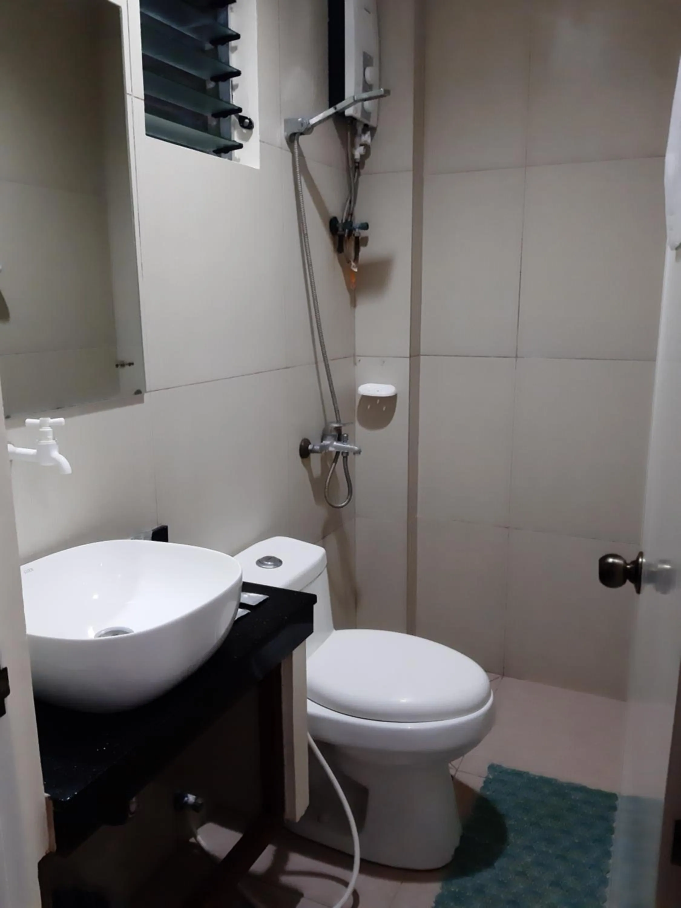 Toilet in SLAM'S Garden Dive Resort