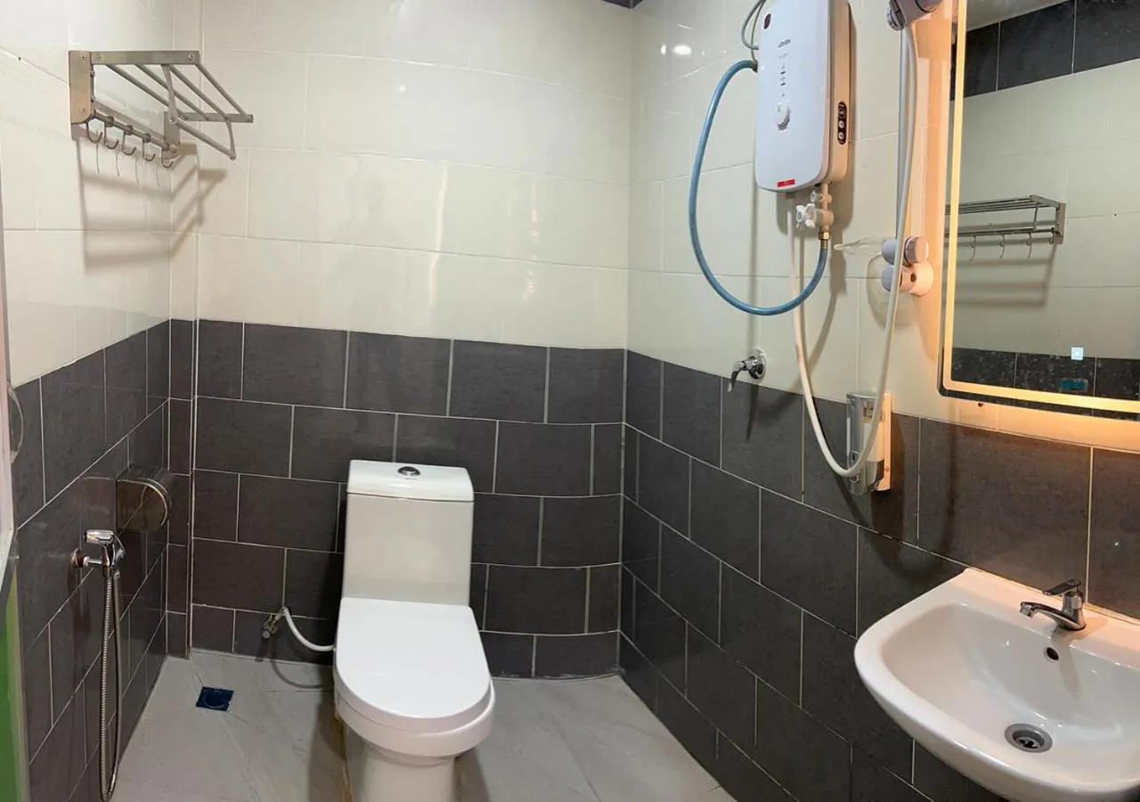 Bathroom in D'Lima Beach Inn